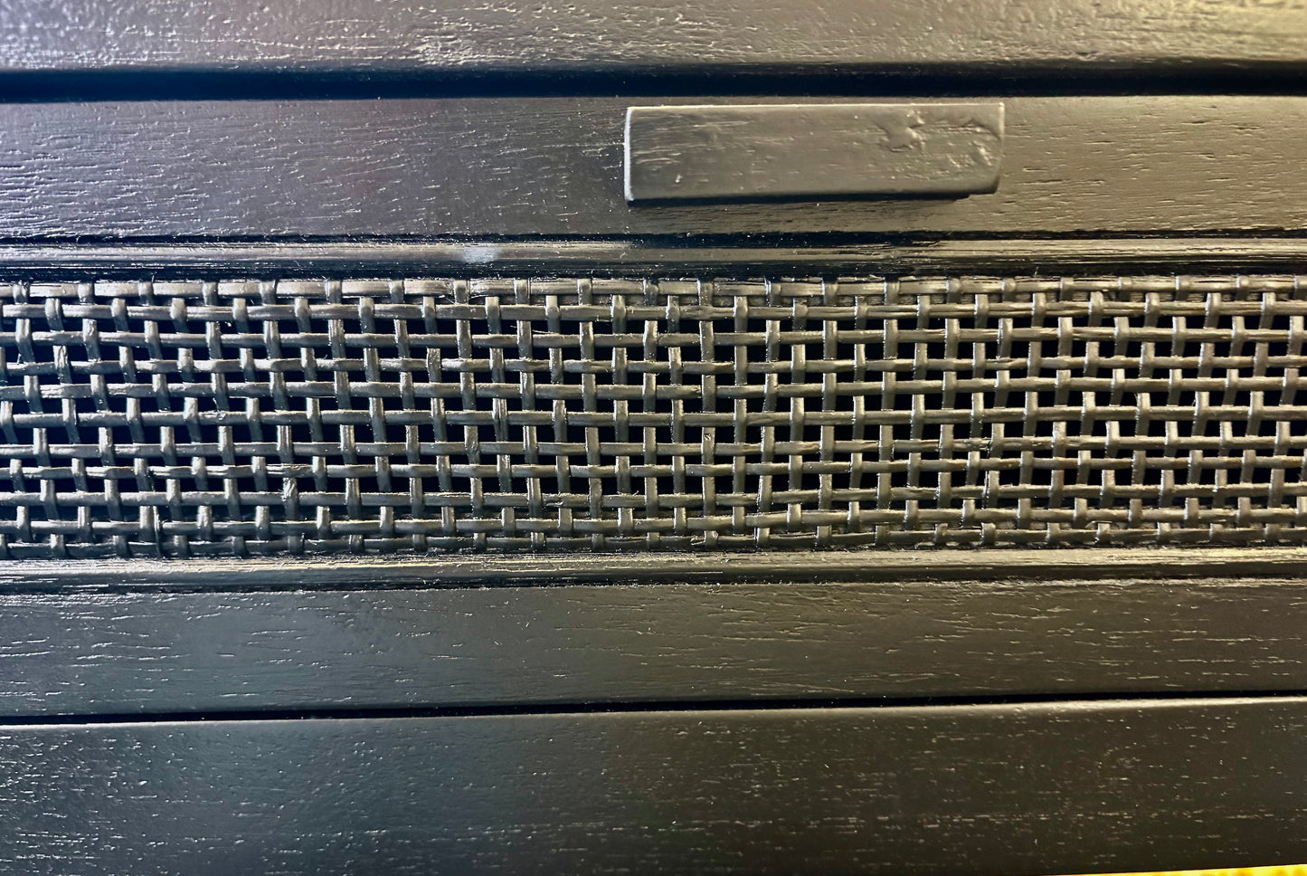 The Milan - 1 Drawer Black console boasts coastal and contemporary style. Crafted from sustainable white cedar timber, it features 1 drawer, on wooden runners, and an open mesh rattan drawer face. Colour Black. Measures 800 length X 250 depth X 750 height. Close.