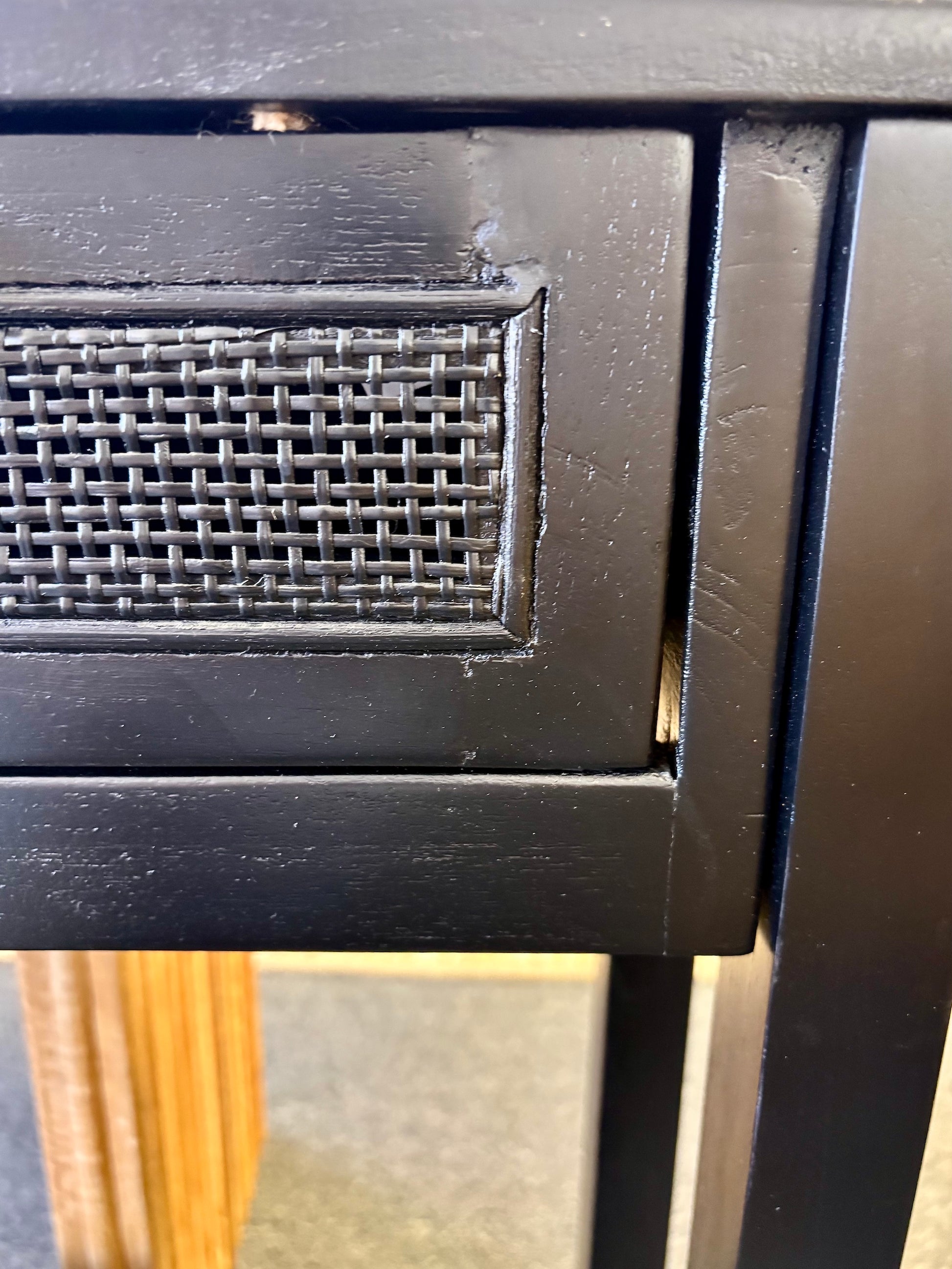 The Milan 2 Drawer Black console boasts coastal and contemporary style. Crafted from sustainable white cedar timber, it features 2 drawers, on wooden runners, and an open mesh rattan drawer face. Colour Black. Measures 1500 length X 250 depth X 750 height. End.