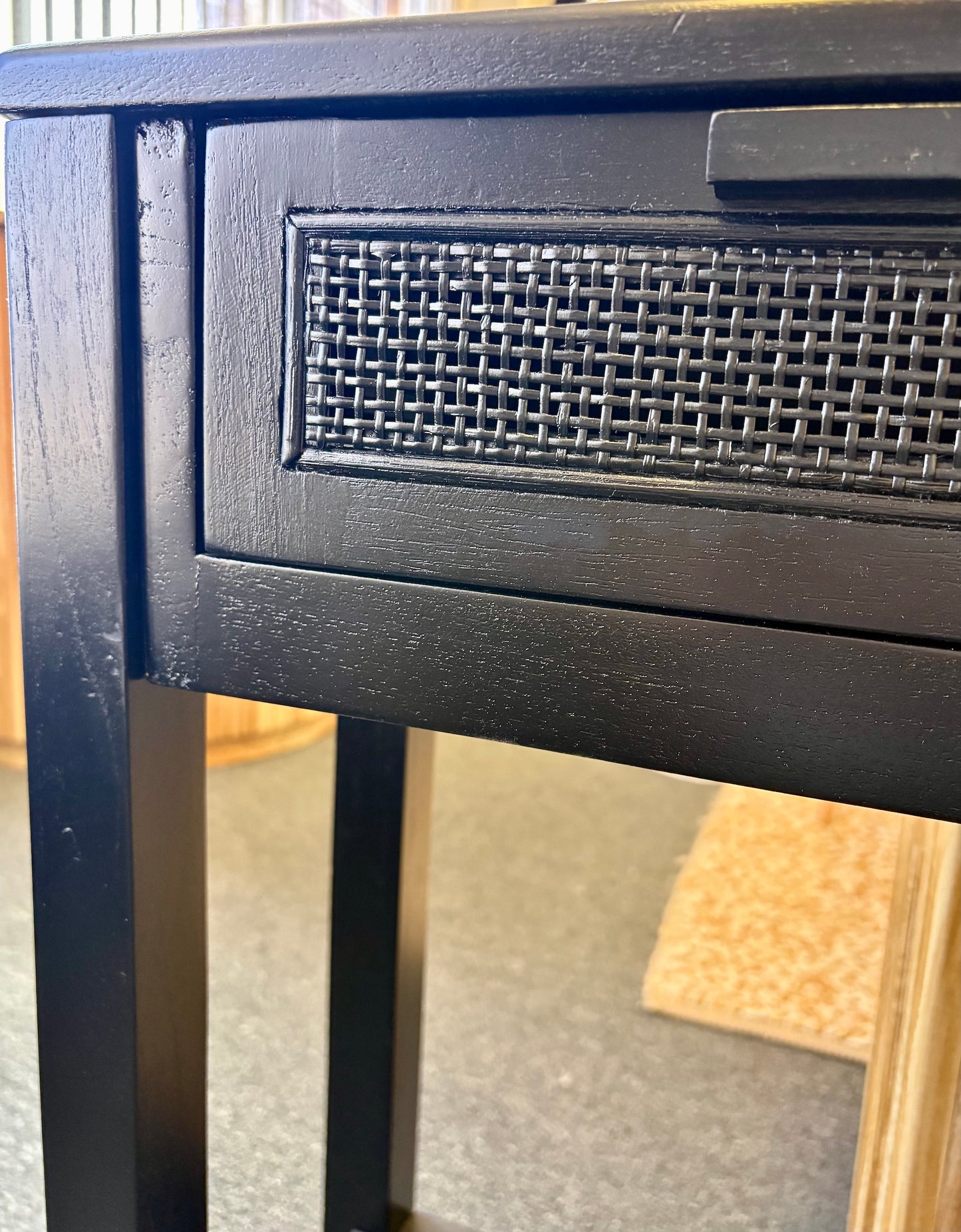 The Milan 2 Drawer Black console boasts coastal and contemporary style. Crafted from sustainable white cedar timber, it features 2 drawers, on wooden runners, and an open mesh rattan drawer face. Colour Black. Measures 1500 length X 250 depth X 750 height. End.