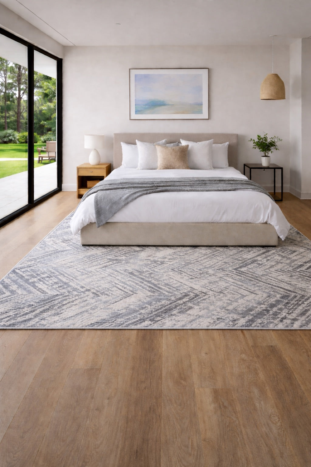 A Modern Patterned Machine Made Polyester Rug Styled in a Modern Perth home Bedroom setting.