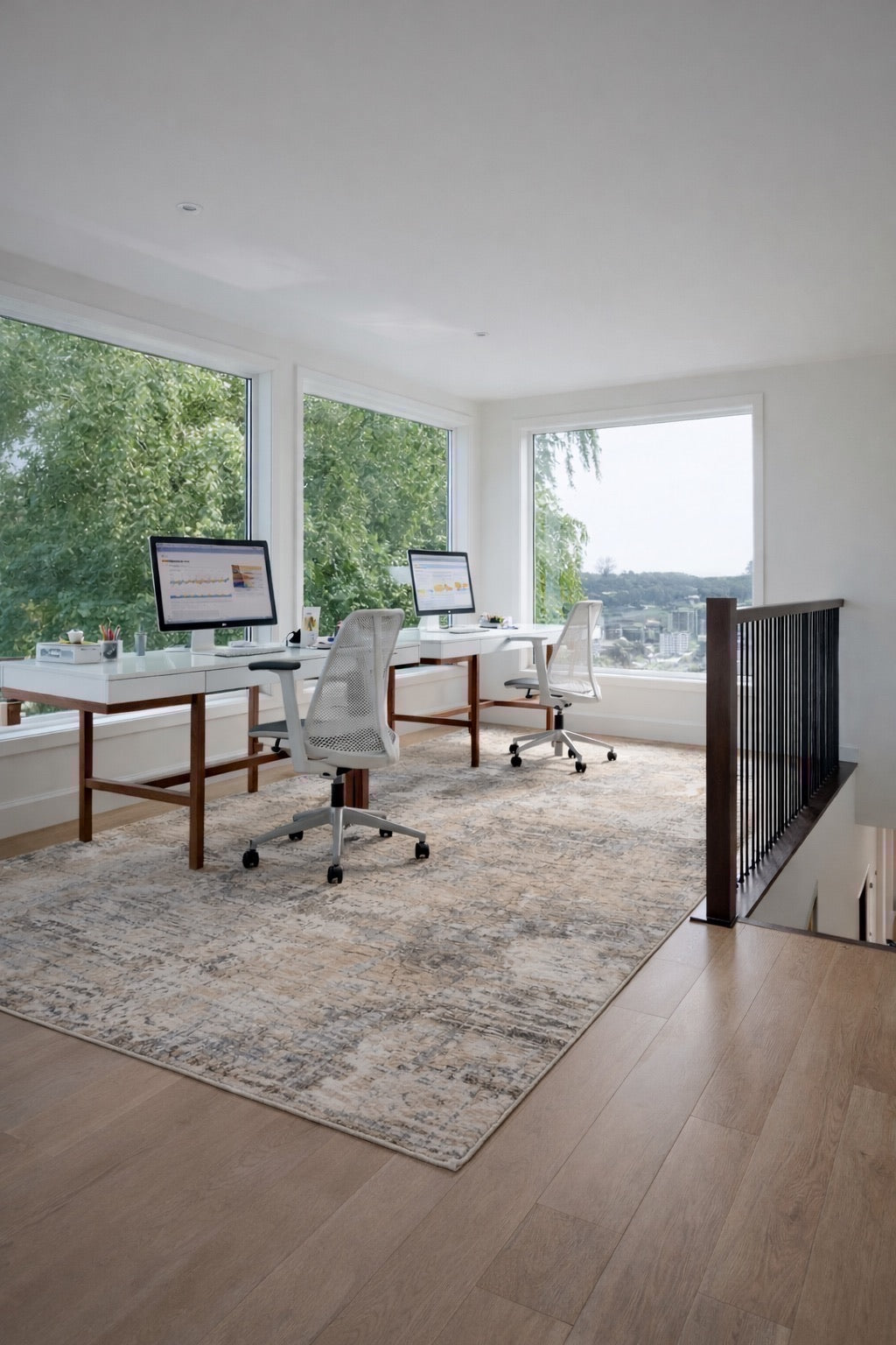 A modern patterned machine made rug styled in a Perth home office setting.