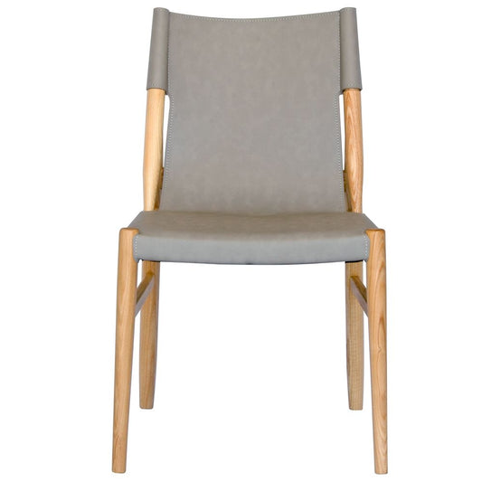 The Modoc - Grey Dining Chair blends style & durability with a solid ash frame & grey saddle leather, perfect for modern, minimalist & coastal spaces. Measures 500 Wide x 570 Depth x 450 Seat Height. Back Height 830. Colour Natural Frame with Grey seat and back. Front Plain. 