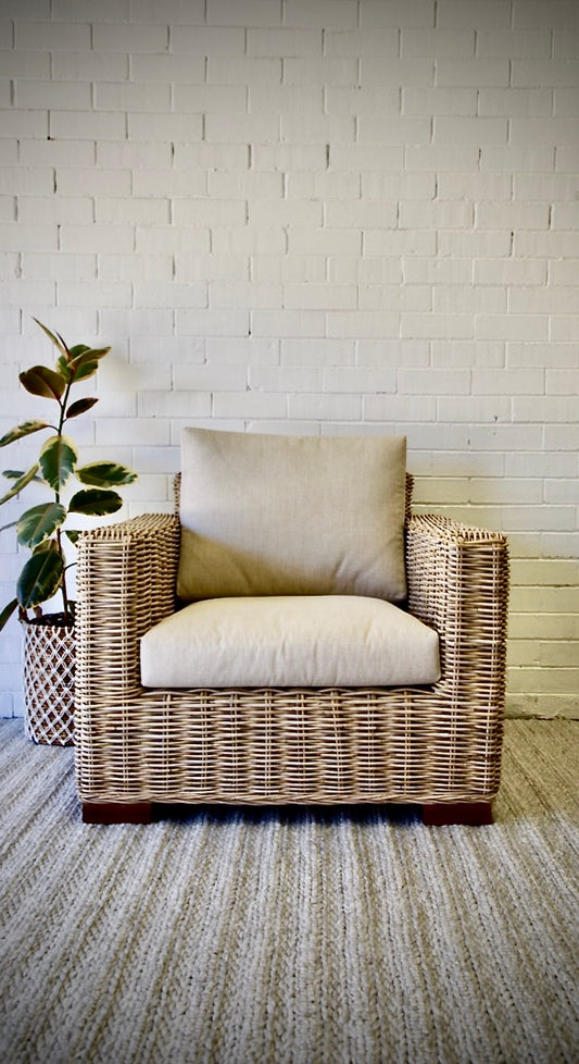 The Mojave Occasional Chair is an indoor/outdoor lounge chair. featuring a rattan weave and cushioned seat and back. Colours, natural rattan and white/cream cushions. Measures 940 wide X 890 depth X 500 w/cushion seat height. Back height 770. Front Styled.