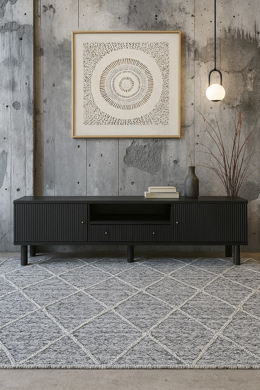 The Monroe 2 Door 1 Drawer Black Entertainment Unit is a contemporary piece of furniture. Crafted from sustainable white cedar, it comes with two textured doors and a shelf and 1 drawer. Colour Black. Measures 1800 length X 400 depth X 530 height. Styled.