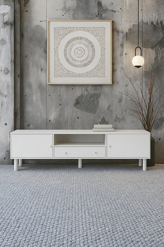 The Monroe 2 Door 1 Drawer White Entertainment unit. With two textured doors, one open shelf and 1 drawer, it offers convenient storage and elevates the aesthetic of your home. Measures  1800 length x 400 depth x 530 height. Styled.
