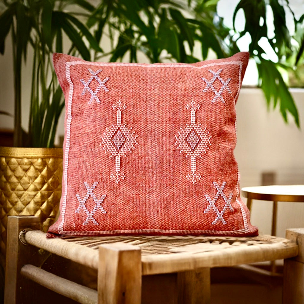 The Moroccan Burnt Orange Cushion is hand crafted in India. Features a cotton weave with hidden zip on the back. This Moroccan inspired design will bring a boho feel to any area. Colours, orange, cream and blues. Measures 50 X 50. Styled.