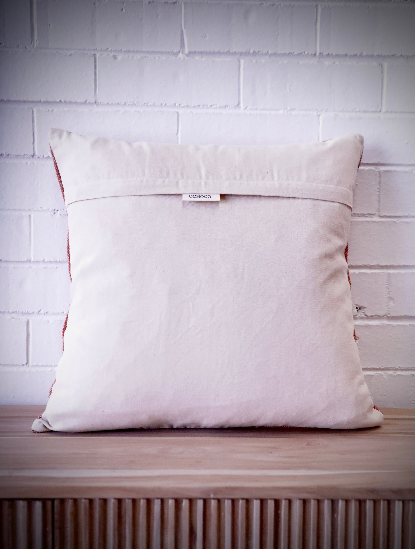 The Moroccan Cloud Cushion is a hand woven cotton weave with hidden zip on the back. Inspired by Moroccan motif's, its sure to bring a Moroccan feel to any area. Colours, light grey and white. Measures 50 X 50. Back.