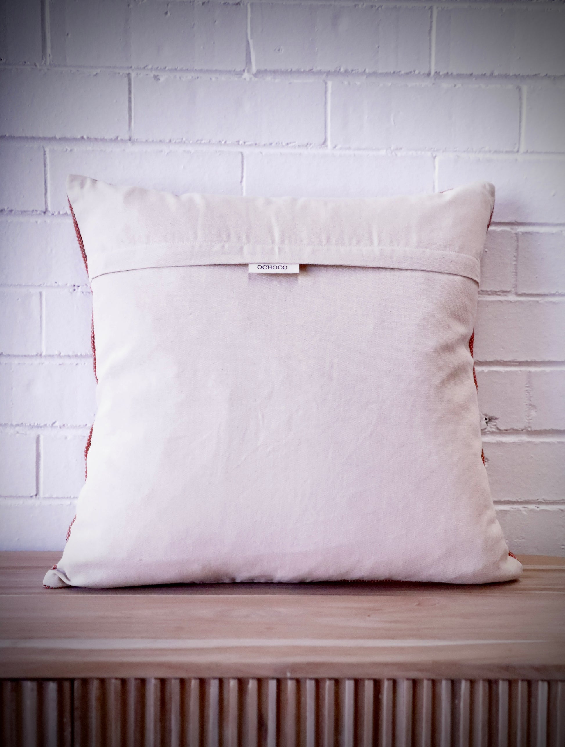 The Moroccan Cloud Cushion is a hand woven cotton weave with hidden zip on the back. Inspired by Moroccan motif's, its sure to bring a Moroccan feel to any area. Colours, light grey and white. Measures 50 X 50. Back.