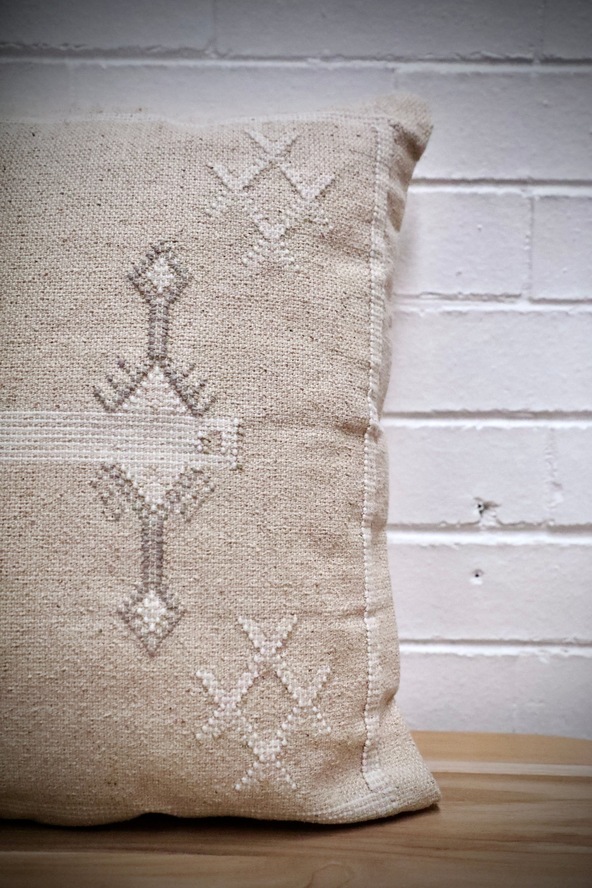The Moroccan Cloud Cushion is a hand woven cotton weave with hidden zip on the back. Inspired by Moroccan motif's, its sure to bring a Moroccan feel to any area. Colours, light grey and white. Measures 50 X 50. Front Side.