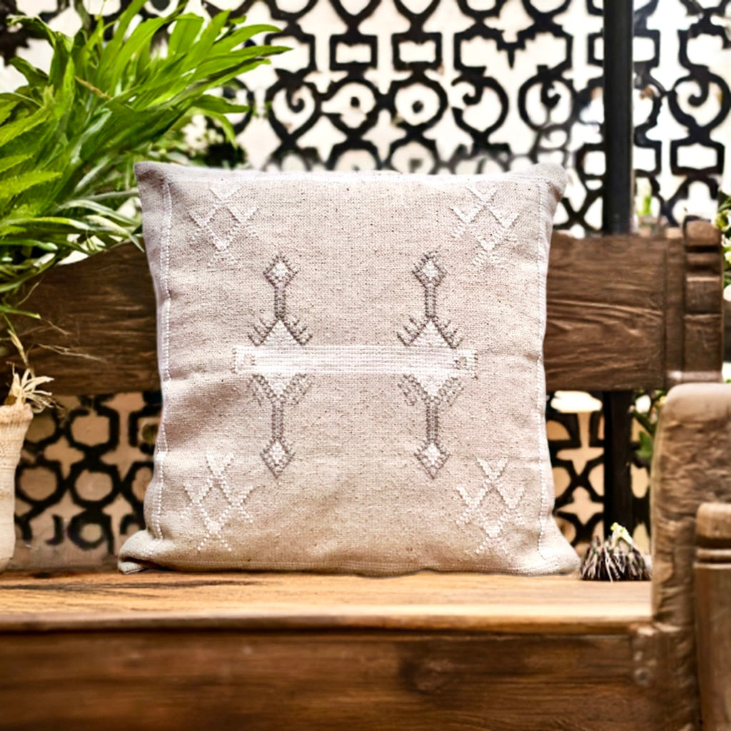 The Moroccan Cloud Cushion is a hand woven cotton weave with hidden zip on the back. Inspired by Moroccan motif's, its sure to bring a Moroccan feel to any area. Colours, light grey and white. Measures 50 X 50. Styled.
