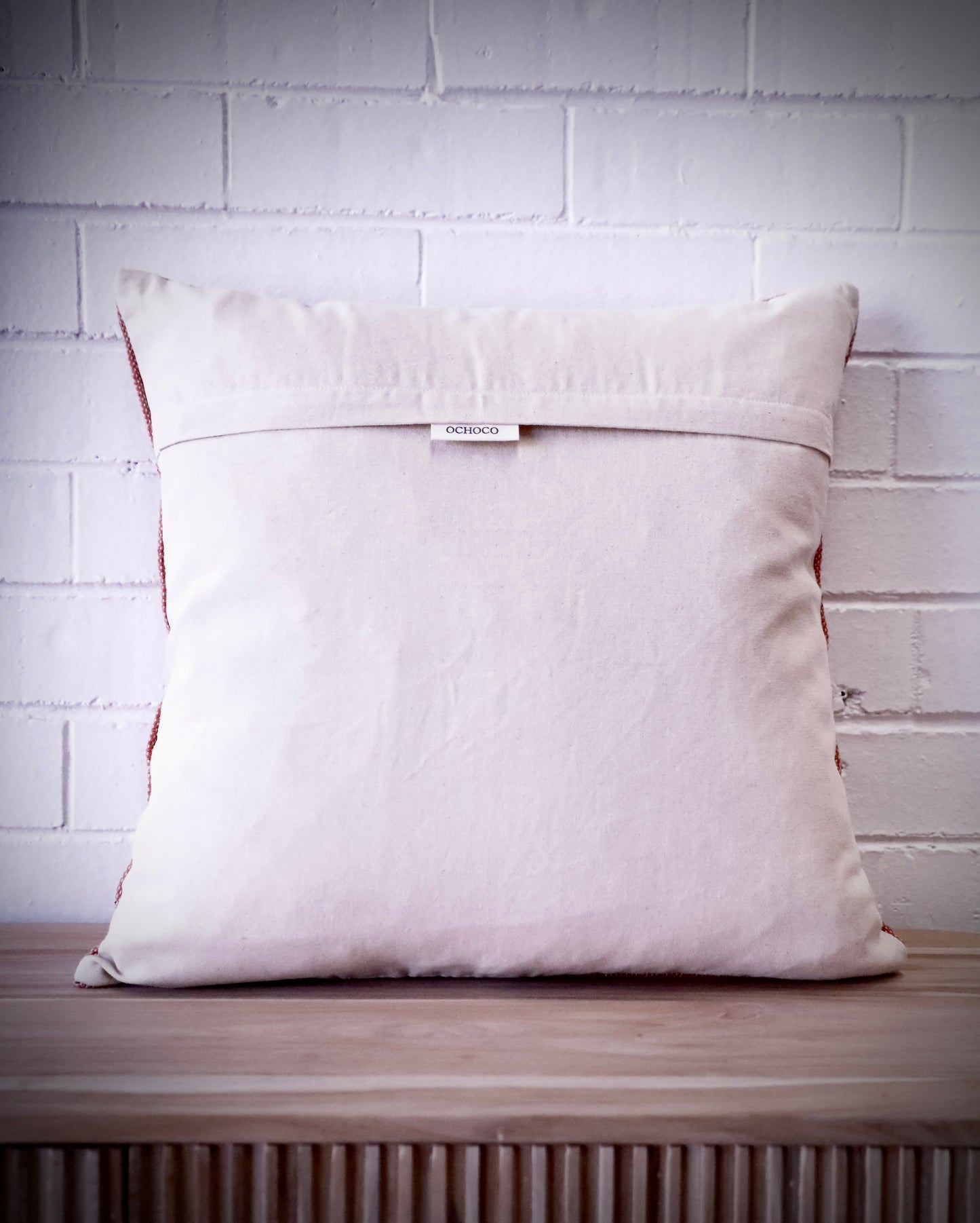 The Moroccan Mustard Yellow Cushion is hand made and features a cotton weave with hidden zip on the back. The Moroccan inspired motif's will bring a tribal feel to any area. Colours, light yellow, cream, brown and blues. Measures 50 X 50. Back.