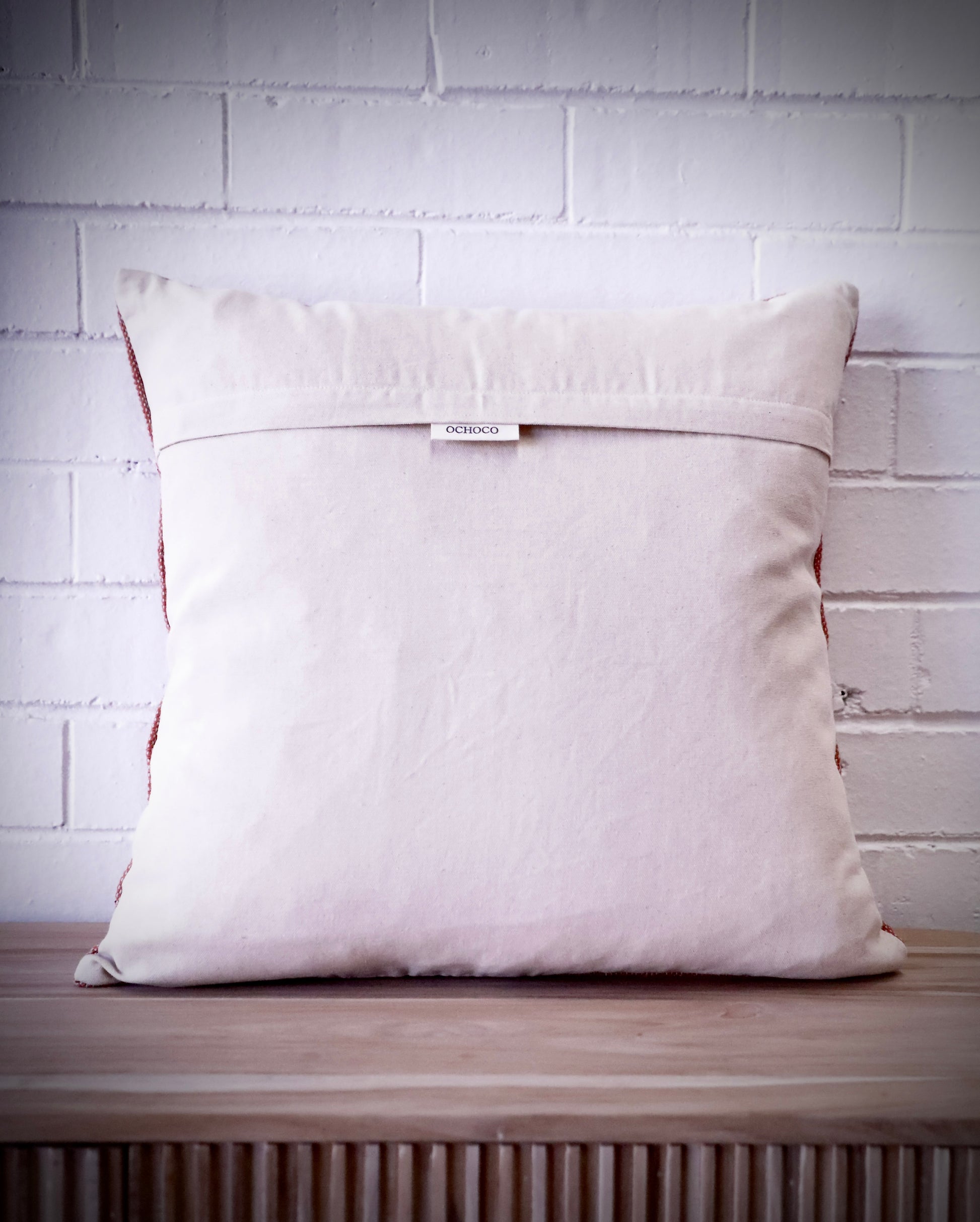The Moroccan Mustard Yellow Cushion is hand made and features a cotton weave with hidden zip on the back. The Moroccan inspired motif's will bring a tribal feel to any area. Colours, light yellow, cream, brown and blues. Measures 50 X 50. Back.