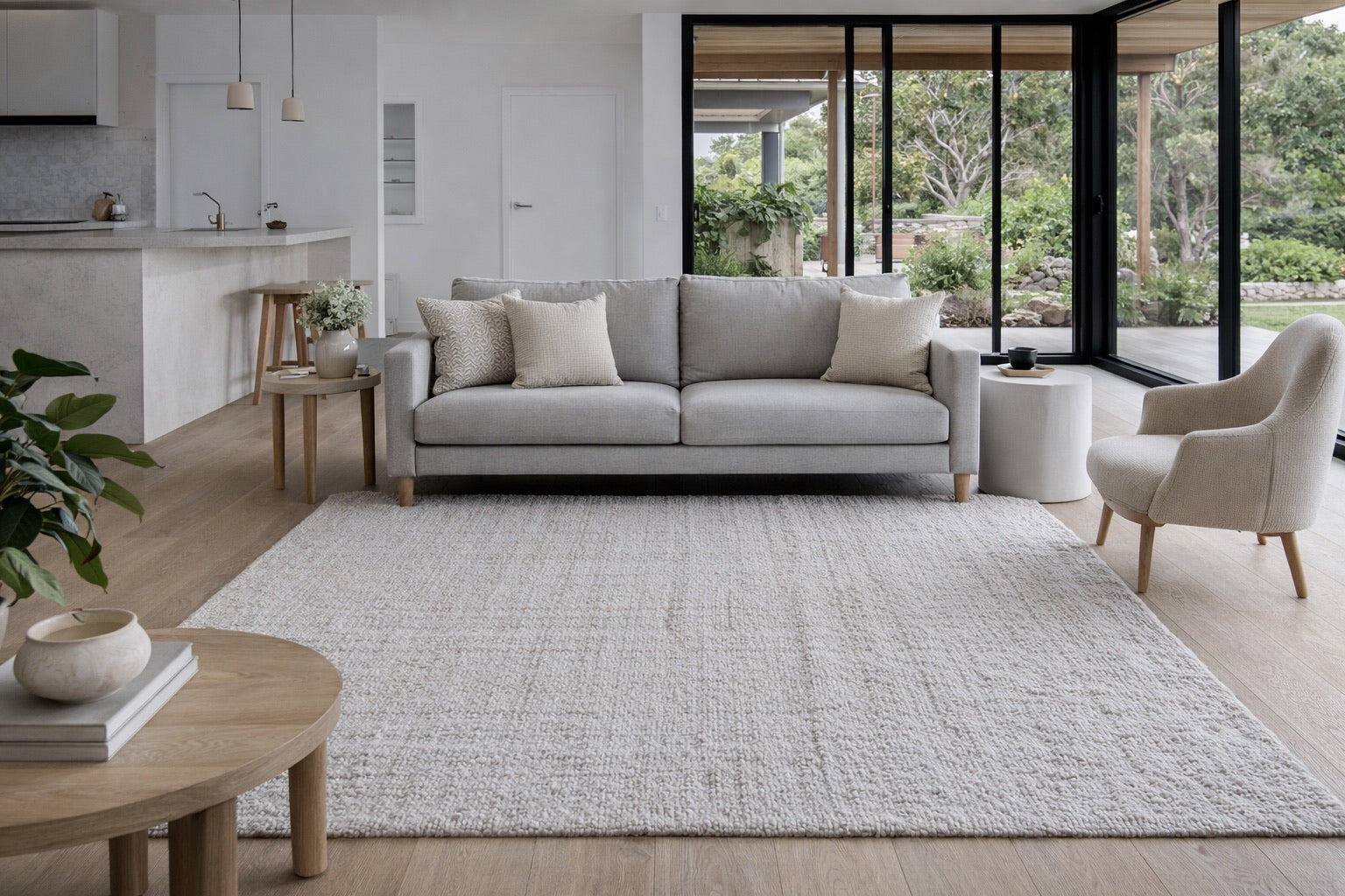 Hand Woven Texture wool rug styled in a modern Perth home living room. Ochoco Rugs Perth.