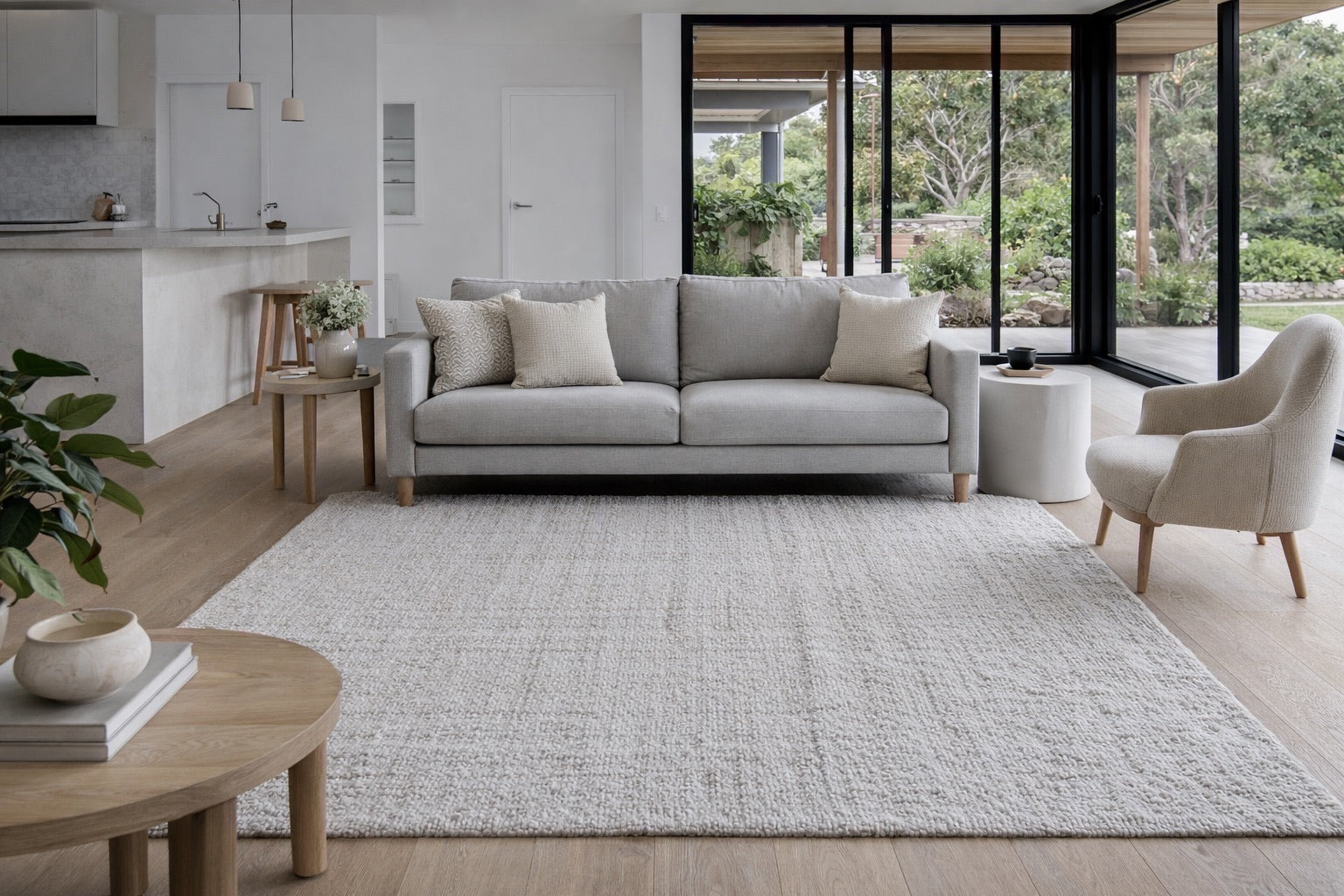 A textured hand woven wool rug styled in a modern Perth home living room setting.