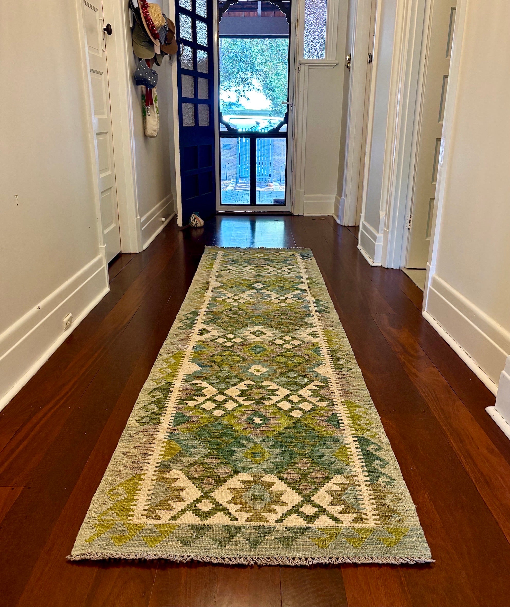 A Khyber Kilim runner rug styled in a heritage East Fremantle hallway setting.