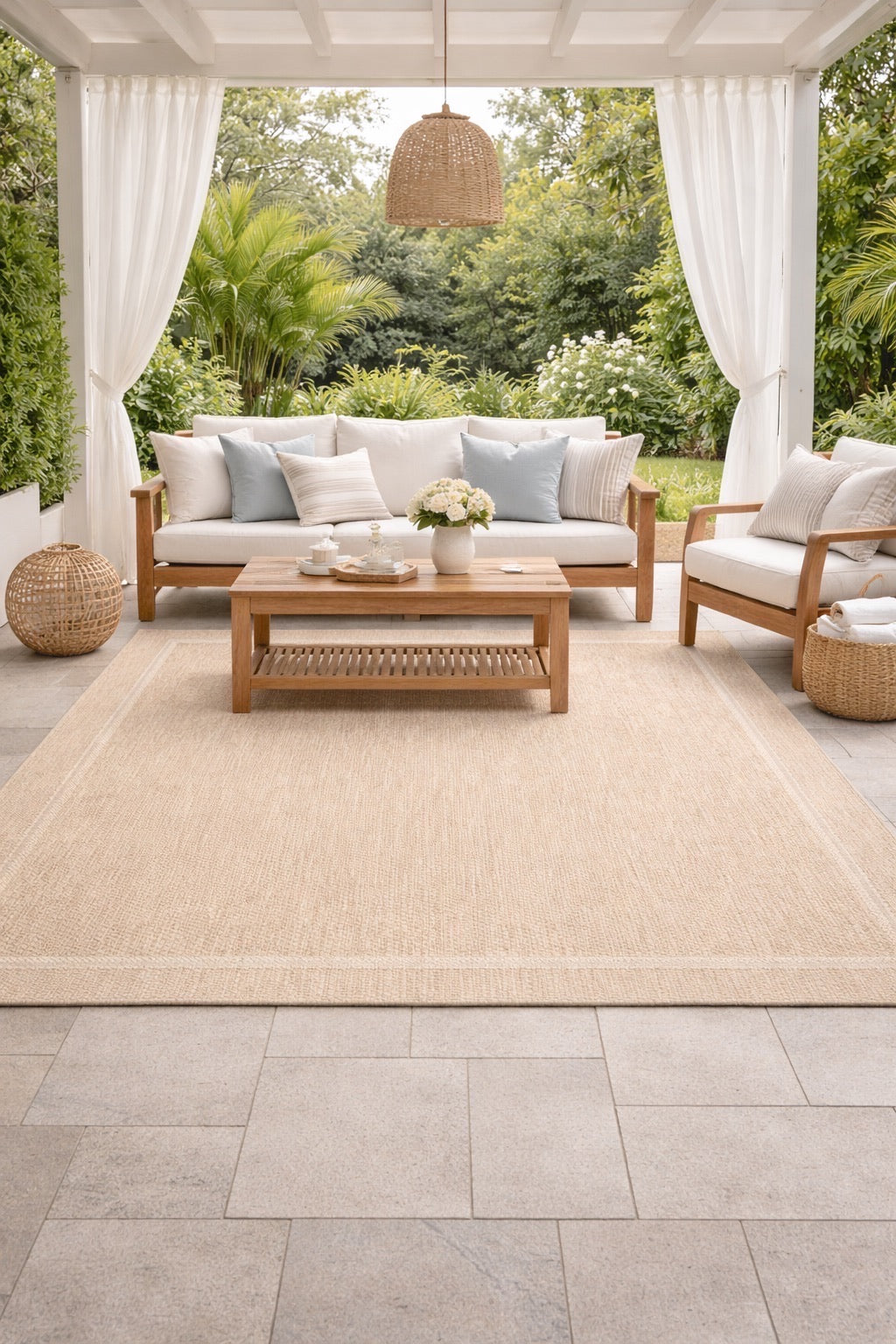 Barton Cream Indoor/Outdoor rug styled in modern Perth home outdoor alfresco area. Ochoco Rugs Perth.