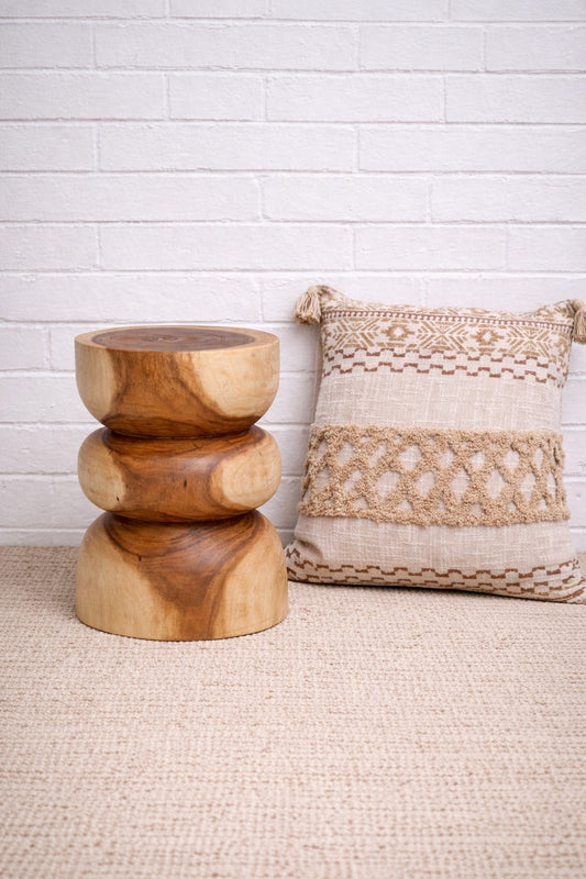 The Ord Side Table / Stool is a low solid piece crafted from natural suar wood. Colour natural. Measures approximately 350 diameter X 500 height.  Styled.