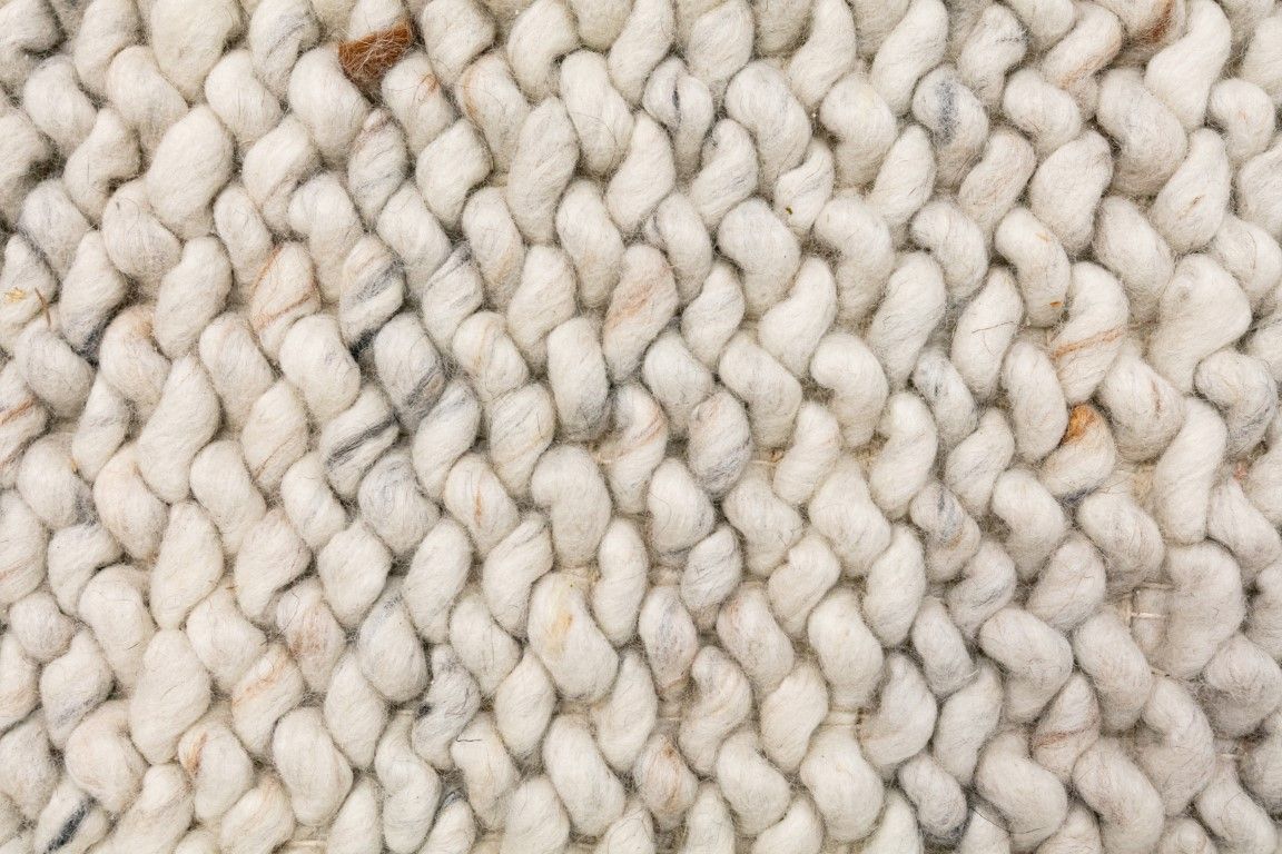 Oslo Greyology 1364 is a textured hand woven, piled loop wool rug. Colours white with grey,  black and brown accents. Sizes 155 X 225, 200 X 290, 240 X 320 and 300 X 400. Close.
