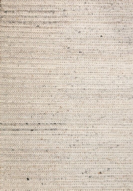 Oslo Greyology 1392 is a textured hand woven,  braided piled wool rug. Colours white with grey,  black and brown accents. Sizes 155 X 225, 200 X 290, 240 X 320 and 300 X 400. Full.