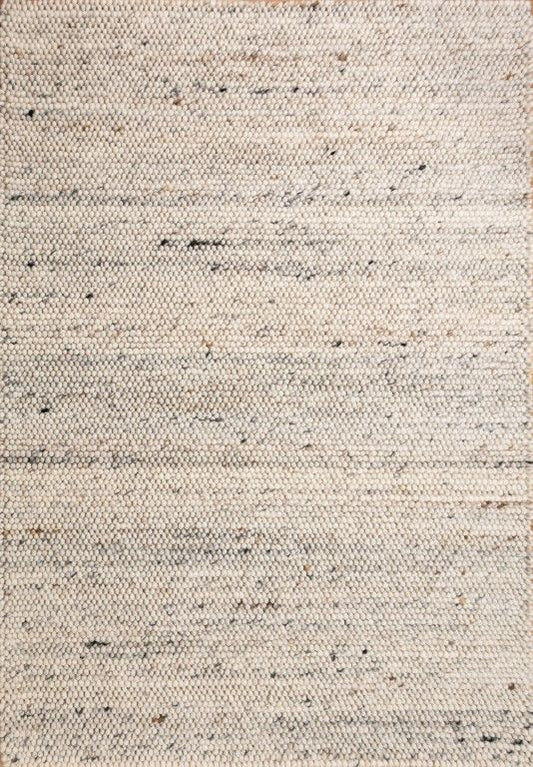 Oslo Greyology 3562 is a textured hand woven,  looped piled wool rug. Colours white with grey,  black and brown accents. Sizes 155 X 225, 200 X 290, 240 X 320 and 300 X 400. Full.