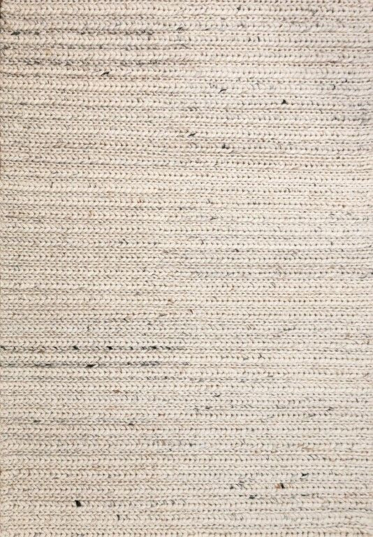 Oslo Braided is a textured hand woven,  braided piled wool rug. Colours white with grey,  black and brown accents. Sizes 155 X 225, 200 X 290, 240 X 320 and 300 X 400. Full.