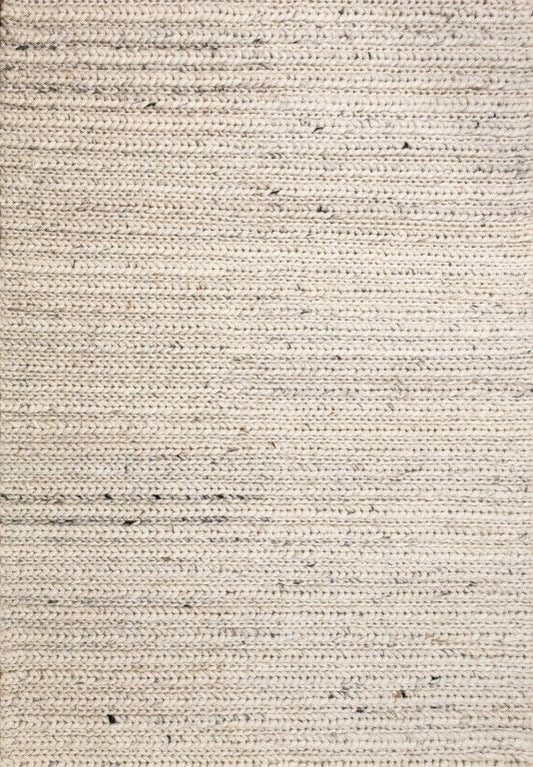 Oslo Braided is a textured hand woven,  braided piled wool rug. Colours white with grey,  black and brown accents. Sizes 155 X 225, 200 X 290, 240 X 320 and 300 X 400. Full.