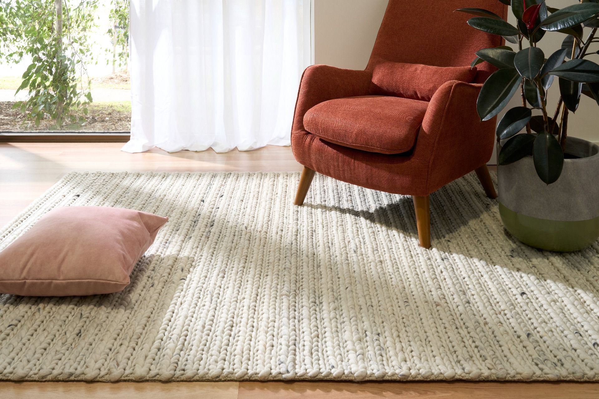 Oslo Greyology 1392 is a textured hand woven,  braided piled wool rug. Colours white with grey,  black and brown accents. Sizes 155 X 225, 200 X 290, 240 X 320 and 300 X 400. Room.