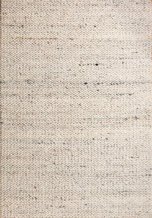 Oslo Loop is a textured hand woven, piled loop wool rug. Colours white with grey,  black and brown accents. Sizes 155 X 225, 200 X 290, 240 X 320 and 300 X 400. Full.