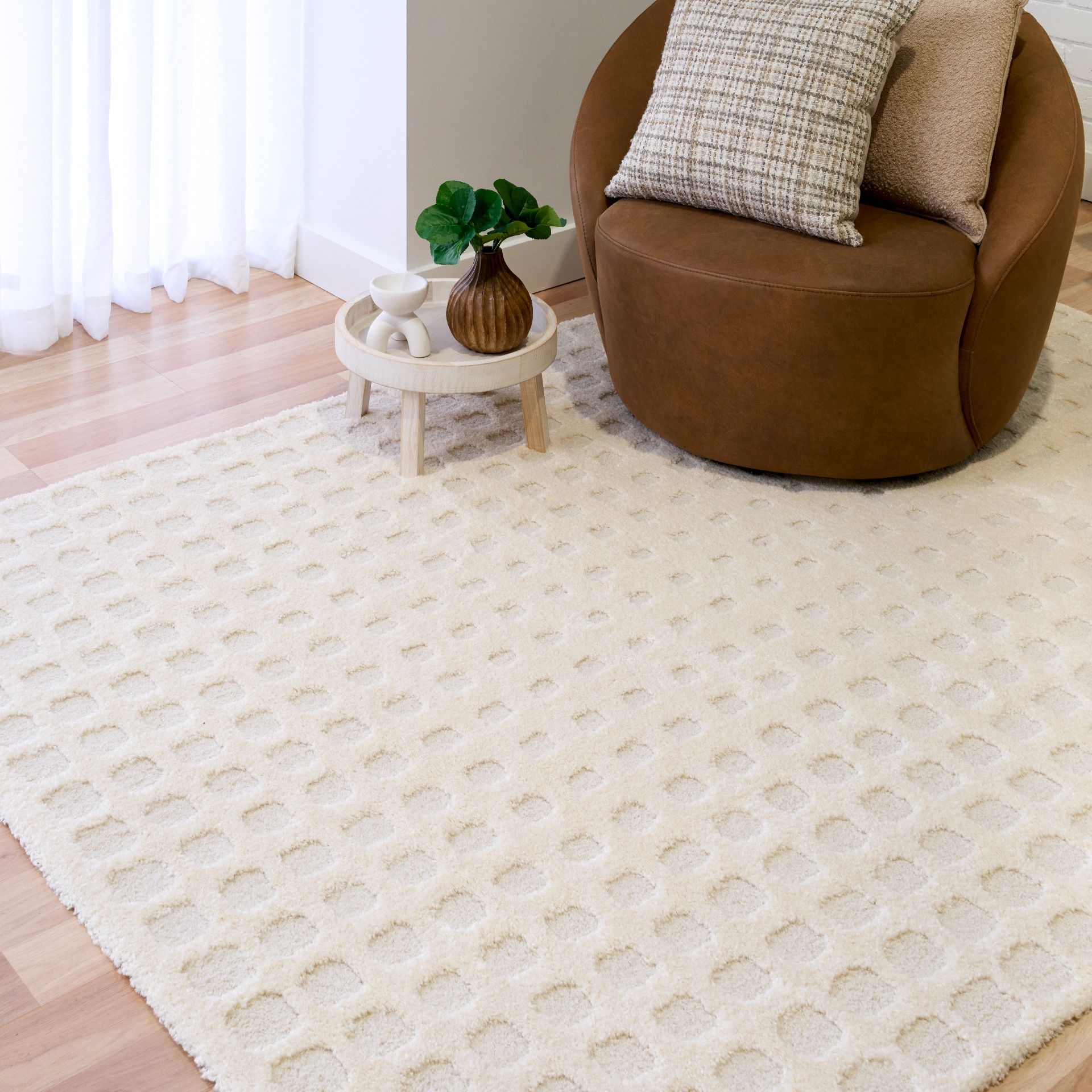 Osmond Squares Ivory rug with soft square patterns in a neutral palette and a high-low textured finish. Colours Ivory and Light Grey. Sizes 160 X 230, 200 X 290 and 240 X 340. Life.