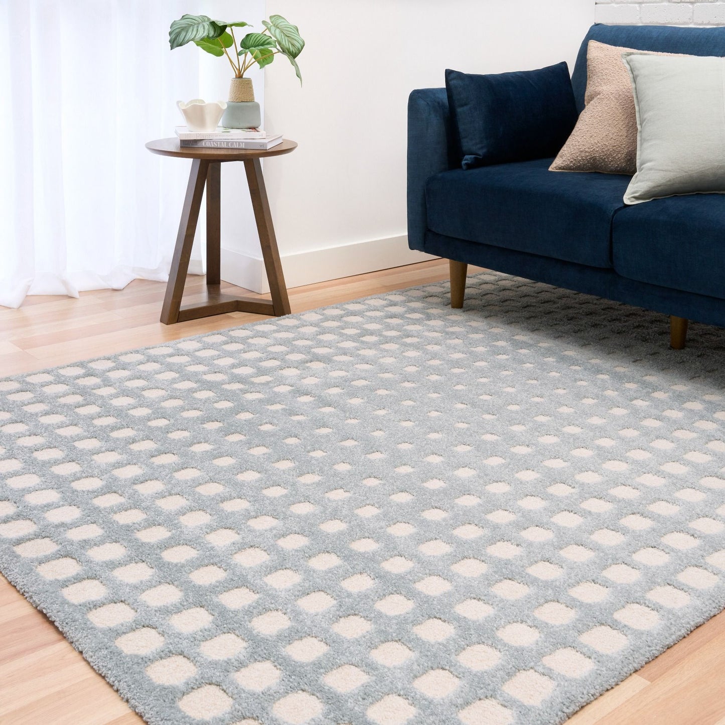 Osmond Squares Light Blue rug with soft square patterns in a neutral palette and a high-low textured finish. Colours Light Blue and Ivory. Sizes 160 X 230, 200 X 290 and 240 X 340. Life.