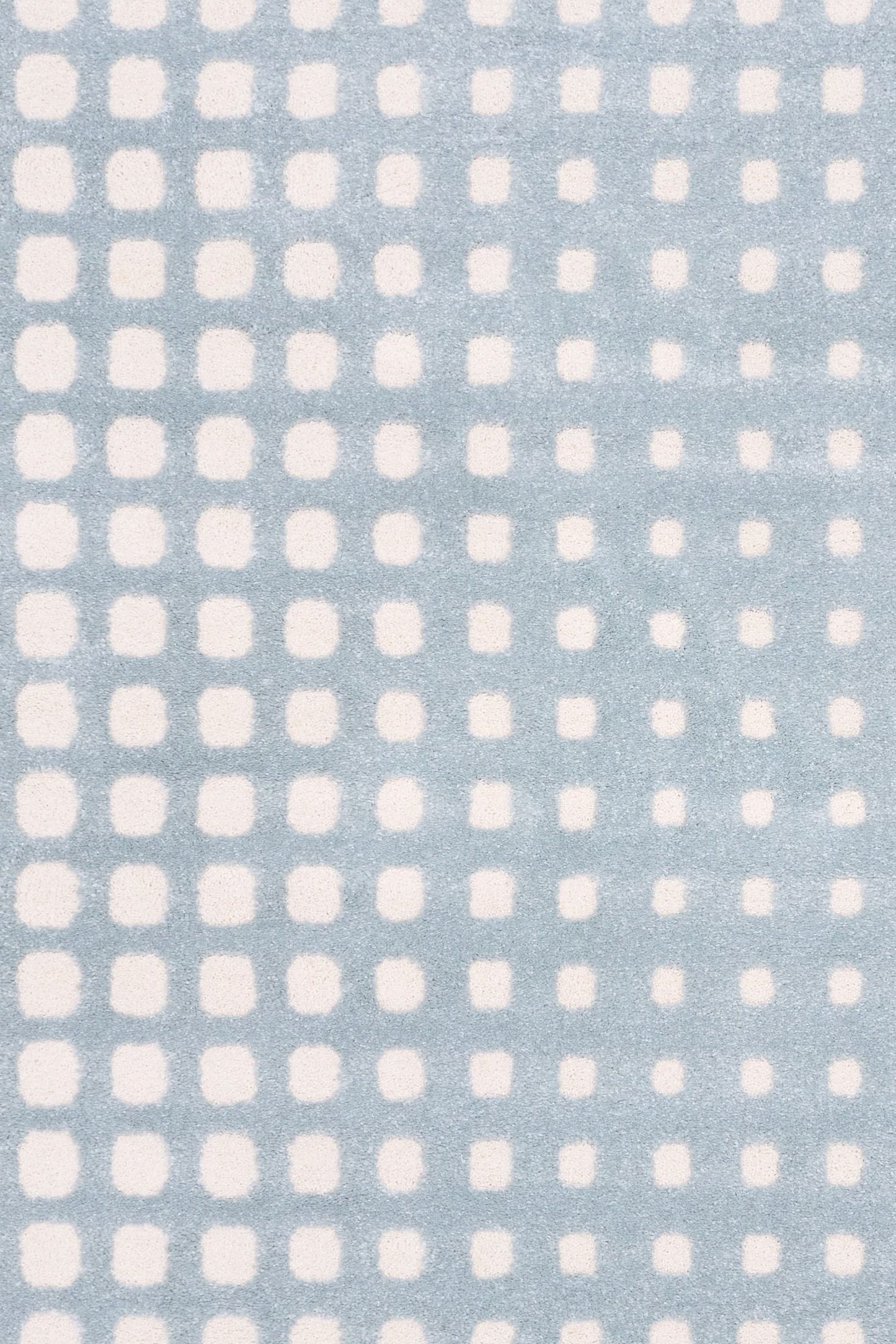Osmond Squares Light Blue rug with soft square patterns in a neutral palette and a high-low textured finish. Colours Light Blue and Ivory. Sizes 160 X 230, 200 X 290 and 240 X 340. Top Close.