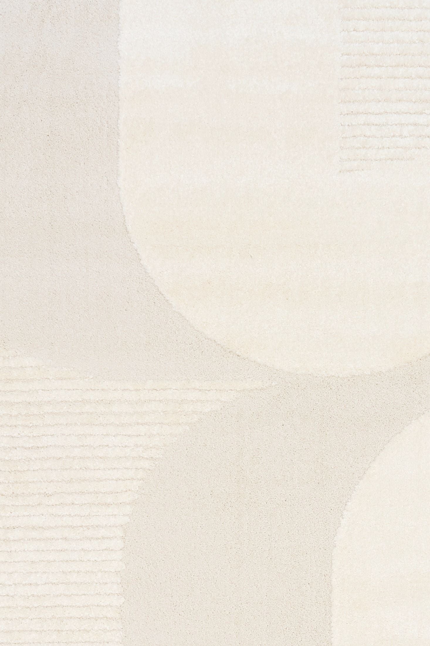 Osmond Waves Ivory rug with soft geometric patterns in a neutral palette and a high-low textured finish. Colours Ivory and Light Grey. Sizes 160 X 230, 200 X 290 and 240 X 340. Top Close.
