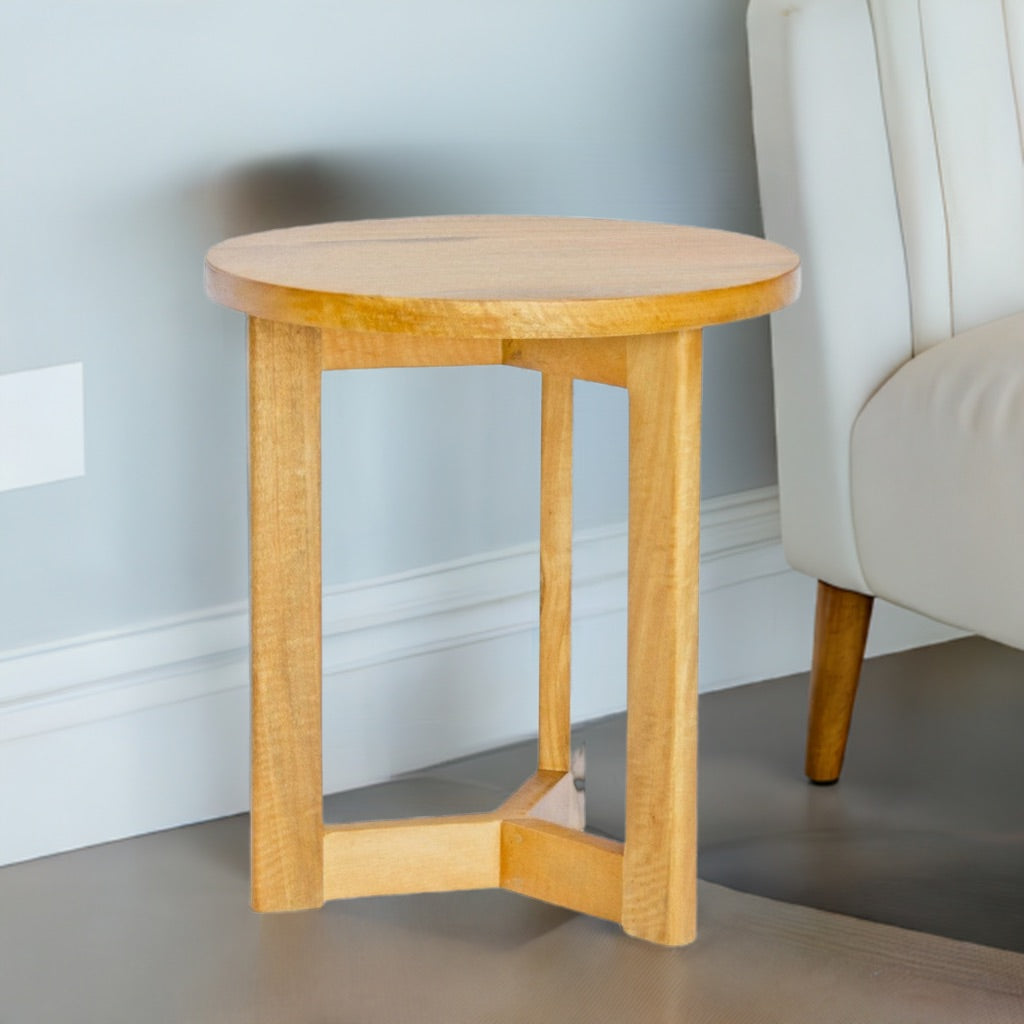 The Otaru Side Table is a modern statement piece. Crafted from sustainable fruitwood with stylish 3-legs and round top. Colour Natural. Measures 500 diameter X 550 height. Styled.