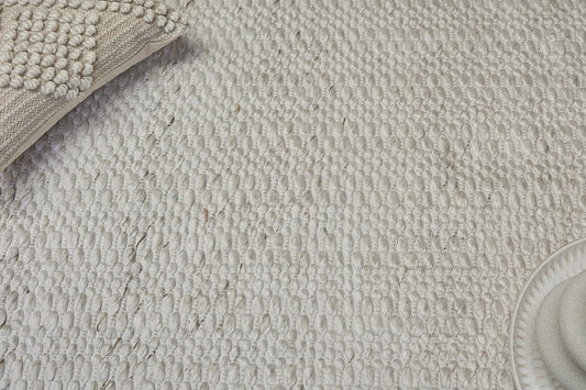 Oxford Ice is a hand-braided rug with a contemporary design. Crafted with wool and polyester for a textured feel, the rug has a pile height of 7-9mm. Colour White with slight brownish accents. Sizes 160 X 230, 200 X 290, 240 X 340 and 300 X 400. Life.