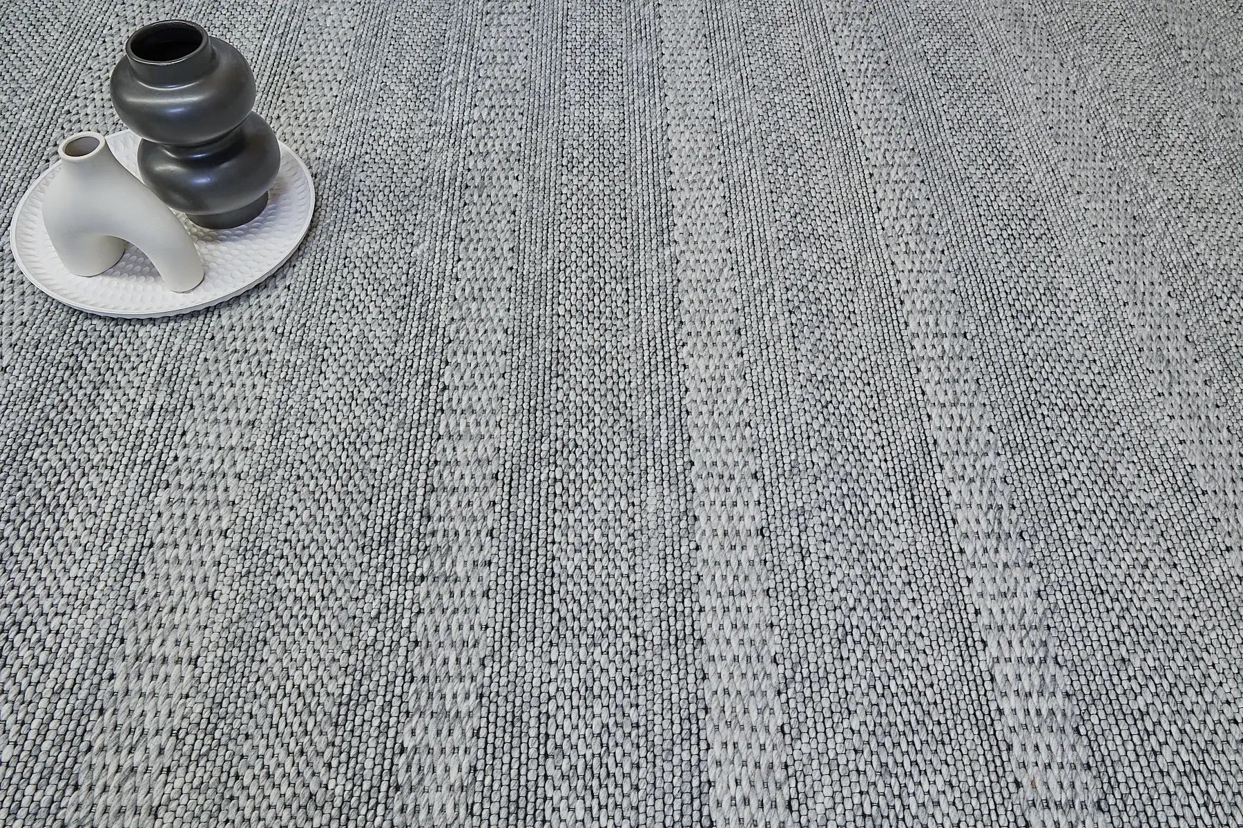 A close view of a PET Yarn Hand Woven Flatweave rug.