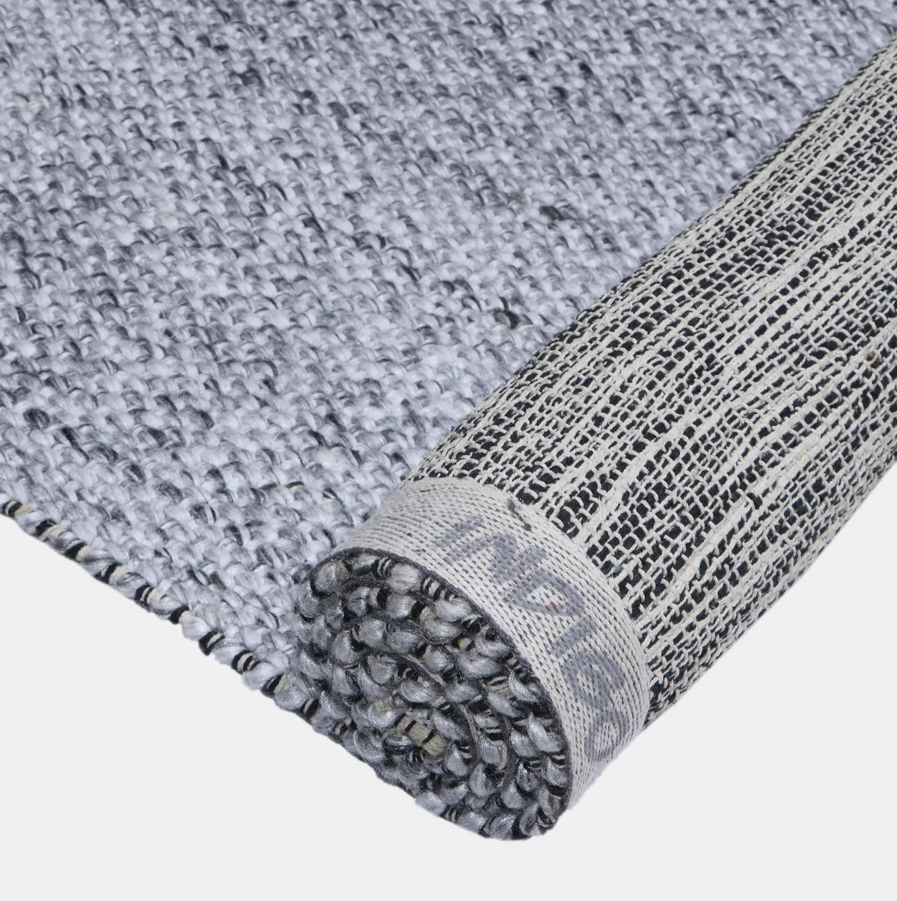 Pacific Black is a handwoven wool and polyester rug with a low-textured cross weave. It boasts a soft pile height of 7-9mm. Colour Black and White. Sizes 160 X 230, 200 X 290, 240 X 340 and 300 X 400. Folded/Rolled.
