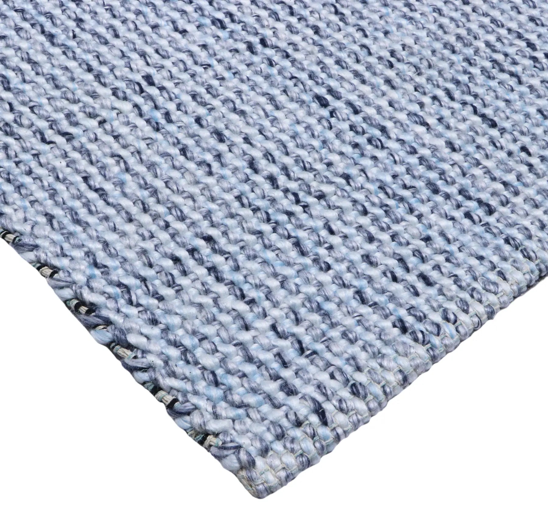 Pacific Blue is a handwoven wool and polyester rug with a low-textured cross weave. It boasts a soft pile height of 7-9mm. Colour blue and White. Sizes 160 X 230, 200 X 290, 240 X 340 and 300 X 400. Corner.