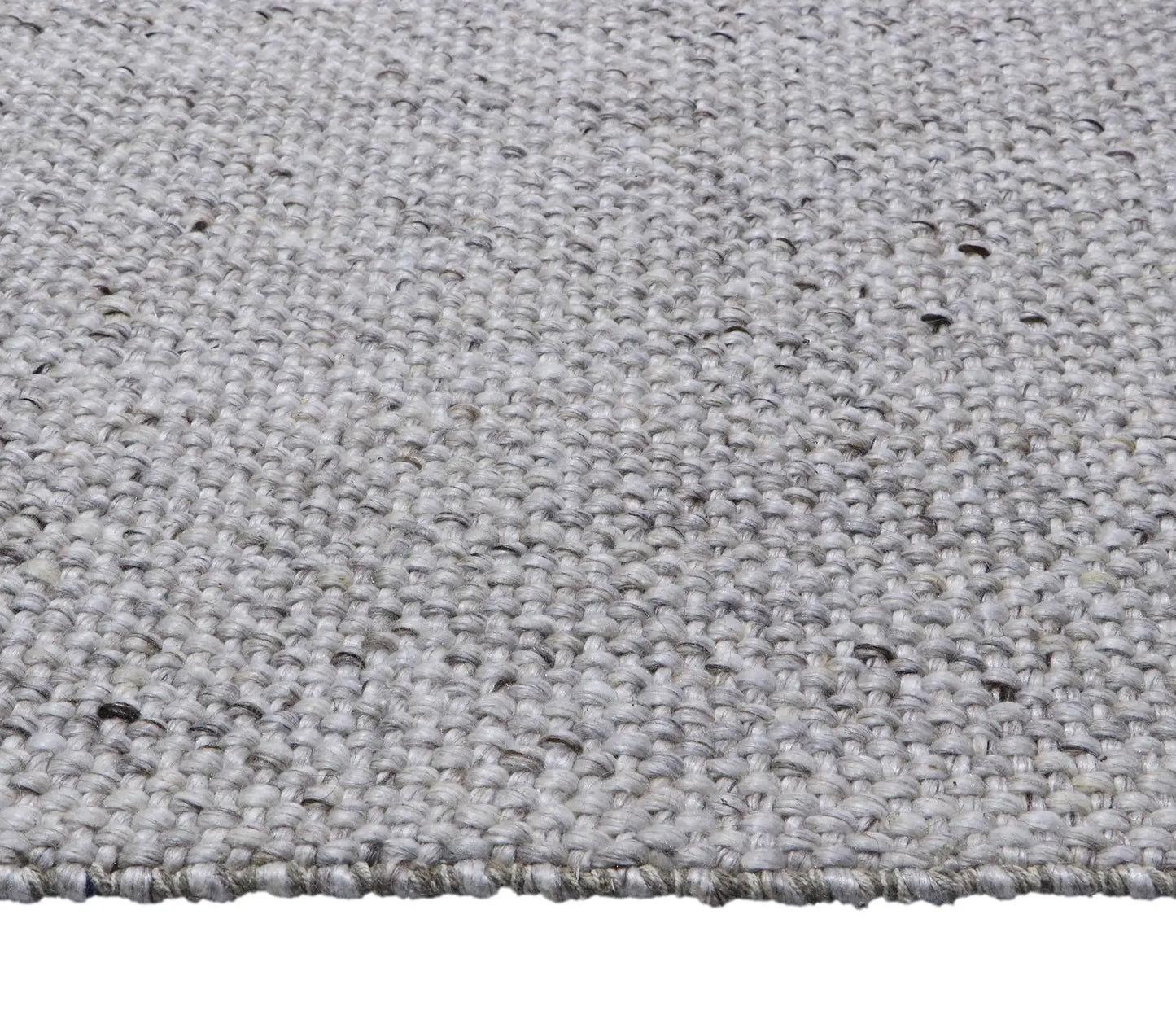 Pacific Camel is a handwoven wool and polyester rug with a low-textured cross weave. It boasts a soft pile height of 7-9mm. Colour White with brownie/black accents.  Sizes 160 X 230, 200 X 290, 240 X 340 and 300 X 400. Side.