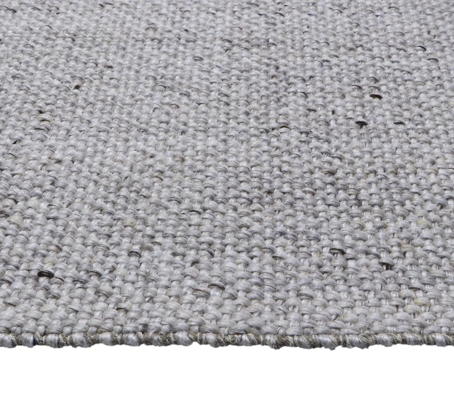 Pacific Camel is a handwoven wool and polyester rug with a low-textured cross weave. It boasts a soft pile height of 7-9mm. Colour White with brownie/black accents.  Sizes 160 X 230, 200 X 290, 240 X 340 and 300 X 400. Side.