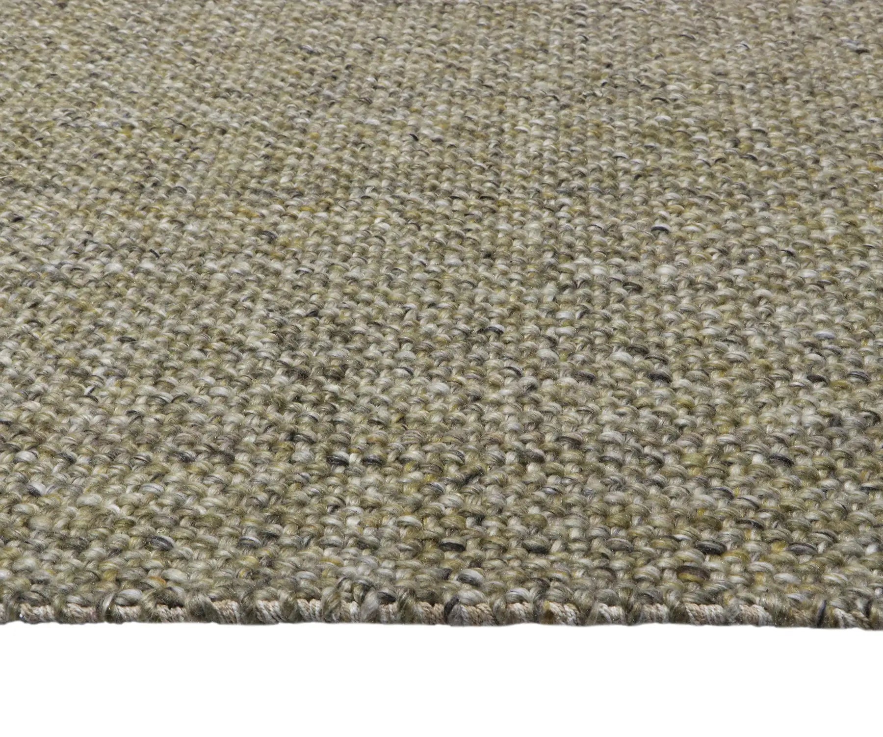 Pacific Cedar is a handwoven wool and polyester rug with a low-textured cross weave. It boasts a soft pile height of 7-9mm. Colour Cedar Green with beige/black accents. Sizes 160 X 230, 200 X 290, 240 X 340 and 300 X 400. Side.