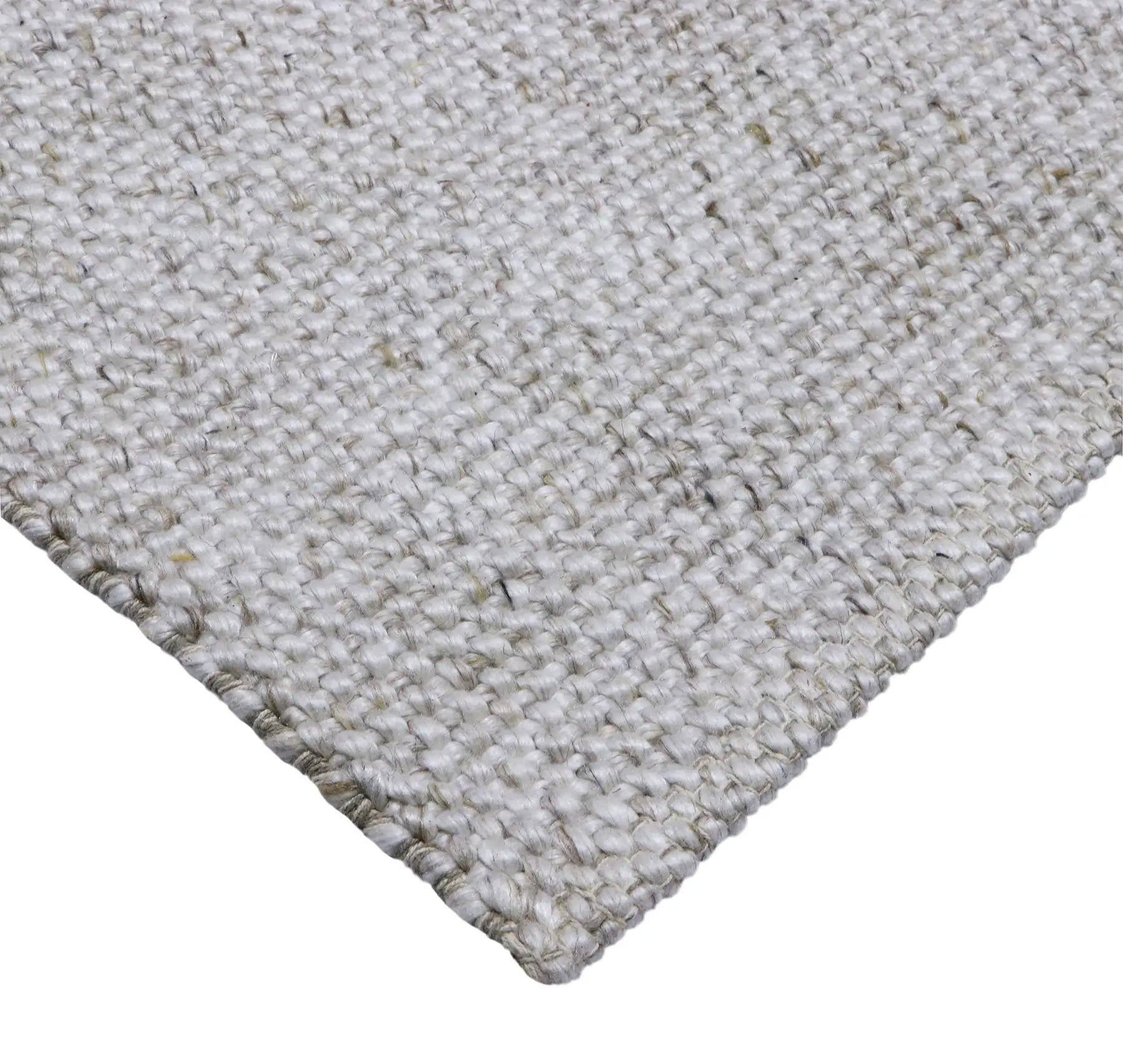 Pacific Grey is a handwoven wool and polyester rug with a low-textured cross weave. It boasts a soft pile height of 7-9mm. Colour White with grey and black accents. Sizes 160 X 230, 200 X 290, 240 X 340 and 300 X 400. Corner.