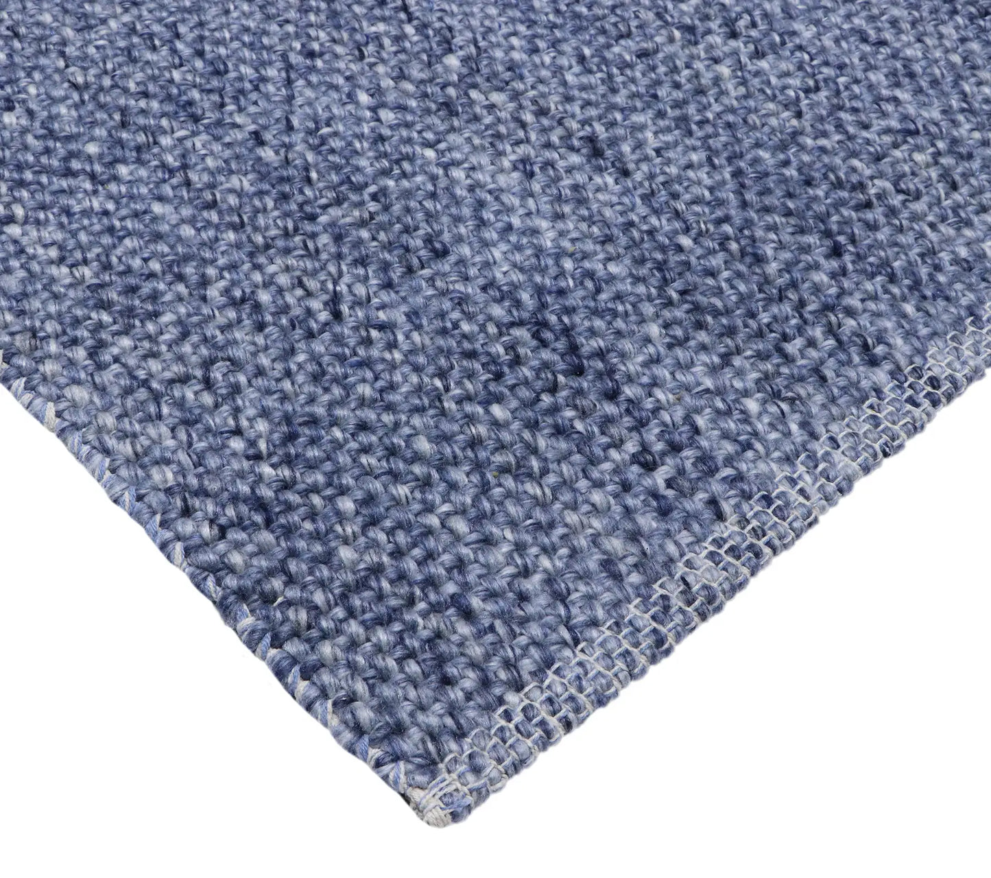 Pacific Navy is a handwoven wool and polyester rug with a low-textured cross weave. It boasts a soft pile height of 7-9mm. Colour Navy blue. Sizes 160 X 230, 200 X 290, 240 X 340 and 300 X 400. Corner.