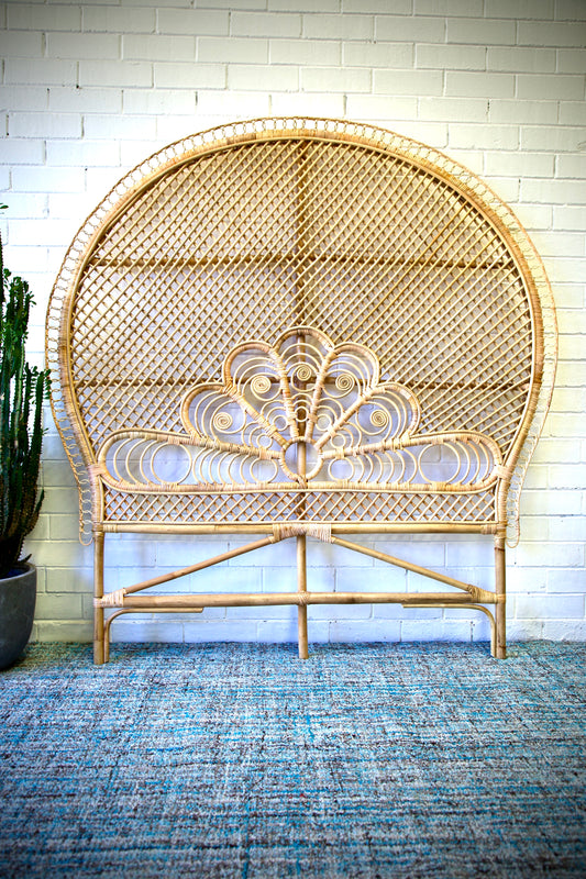 The Pacific Bedhead is crafted with durable rattan. Features an arched top and cross weave ornate rattan weave. Colour natural. Sizes Queen and King. Front Styled.