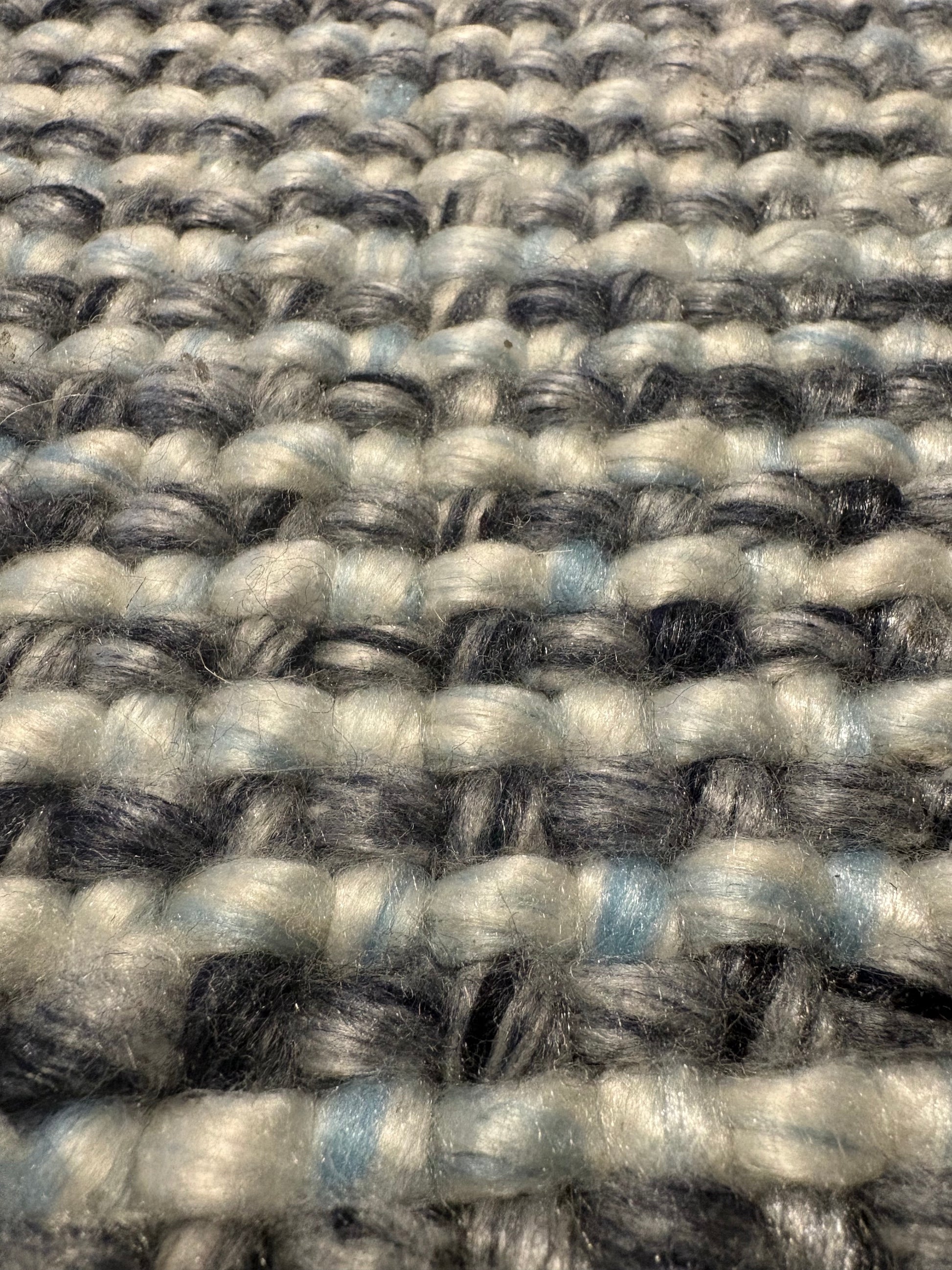Pacific Blue is a handwoven wool and polyester rug with a low-textured cross weave. It boasts a soft pile height of 7-9mm. Colour blue and White. Sizes 160 X 230, 200 X 290, 240 X 340 and 300 X 400. Super Close.