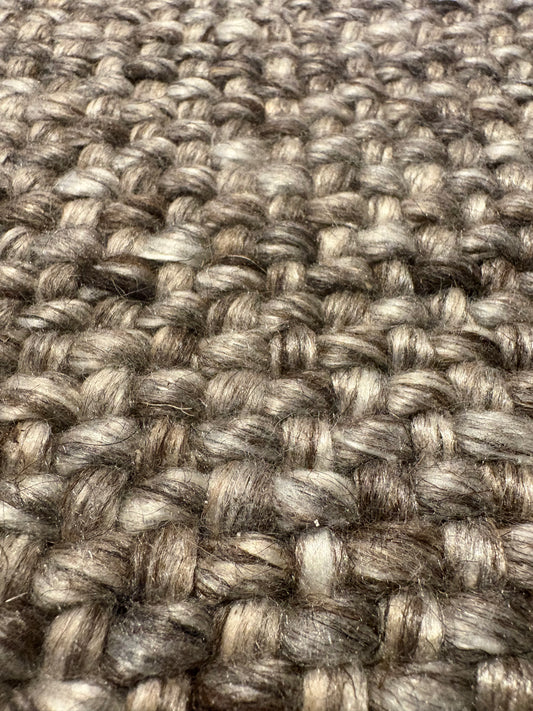 Pacific Brown is a handwoven wool and polyester rug with a low-textured cross weave. It boasts a soft pile height of 7-9mm. Colour brown and grey. Sizes 160 X 230, 200 X 290, 240 X 340 and 300 X 400. Super Close.