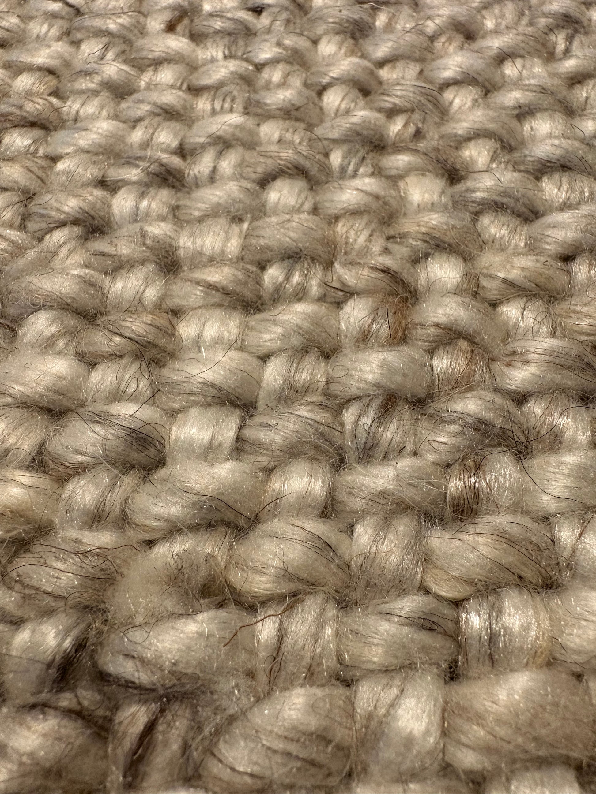 Pacific Camel is a handwoven wool and polyester rug with a low-textured cross weave. It boasts a soft pile height of 7-9mm. Colour White with brownie/black accents.  Sizes 160 X 230, 200 X 290, 240 X 340 and 300 X 400. Super Close.