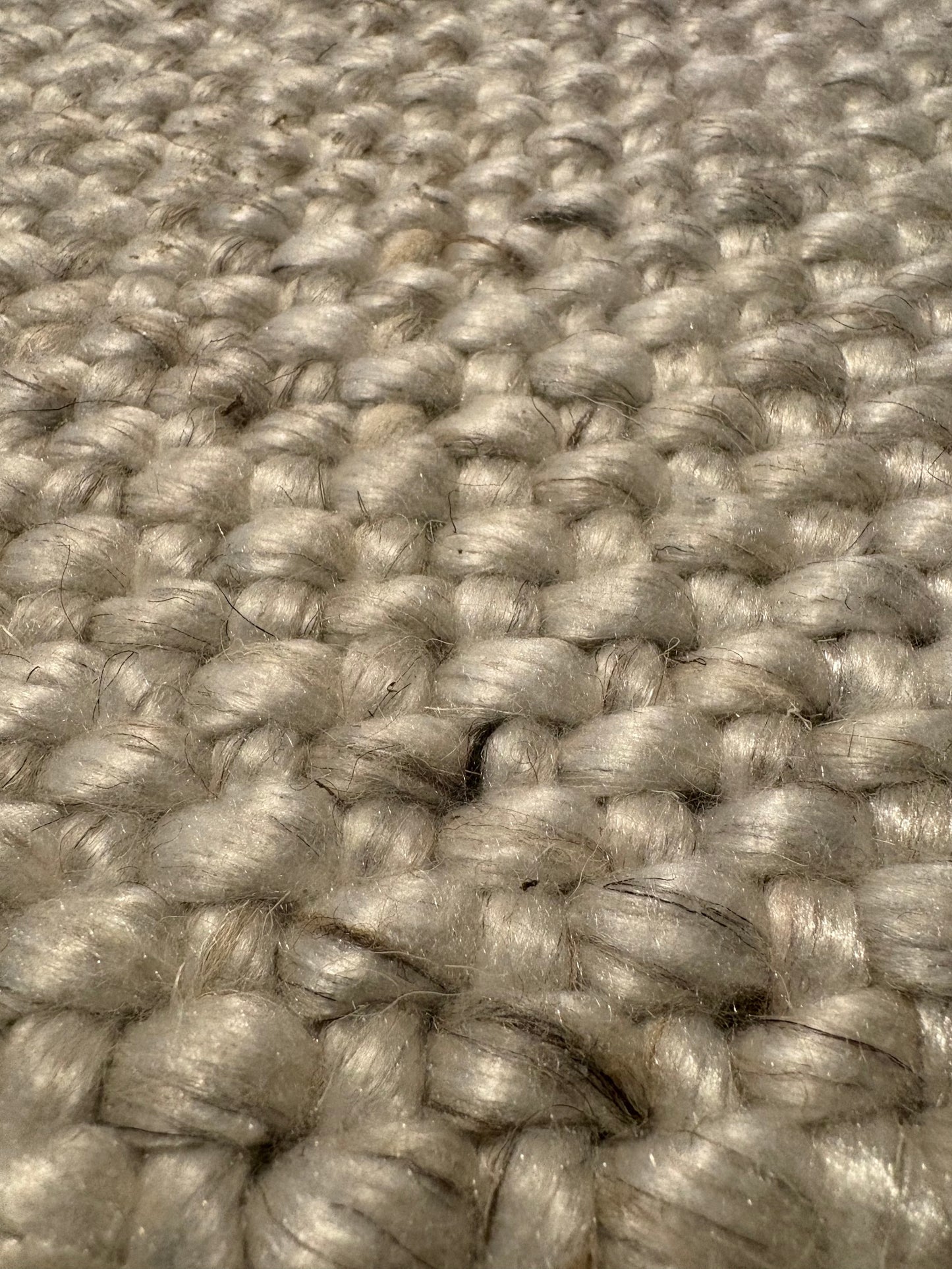 Pacific Grey is a handwoven wool and polyester rug with a low-textured cross weave. It boasts a soft pile height of 7-9mm. Colour White with grey and black accents. Sizes 160 X 230, 200 X 290, 240 X 340 and 300 X 400. Super Close.