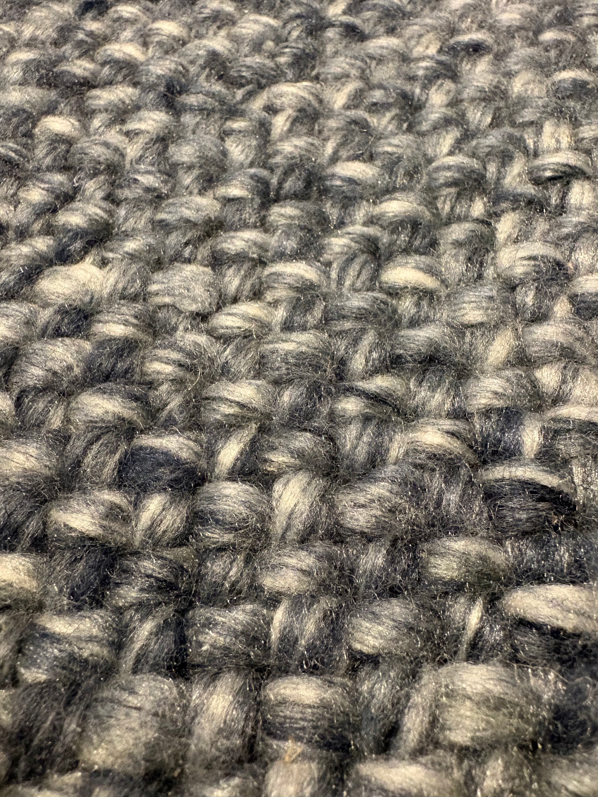 Pacific Navy is a handwoven wool and polyester rug with a low-textured cross weave. It boasts a soft pile height of 7-9mm. Colour Navy blue. Sizes 160 X 230, 200 X 290, 240 X 340 and 300 X 400.  Super Close.