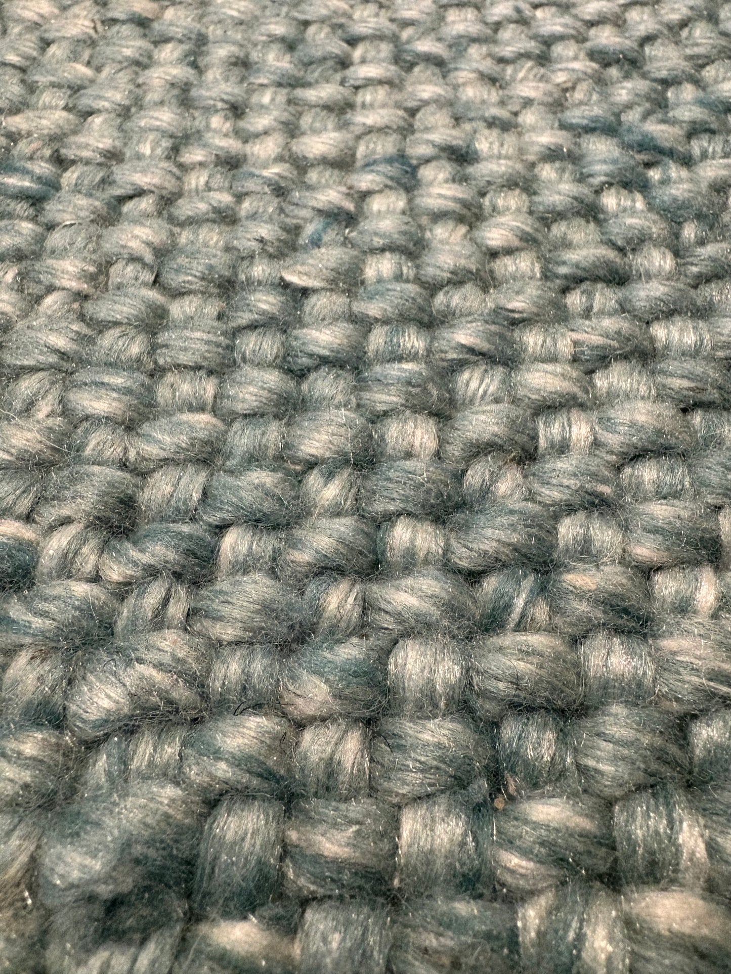 Pacific Green is a handwoven wool and polyester rug with a low-textured cross weave. It boasts a soft pile height of 7-9mm. Colour Aqua Green. Sizes 160 X 230, 200 X 290, 240 X 340 and 300 X 400. Super Close.