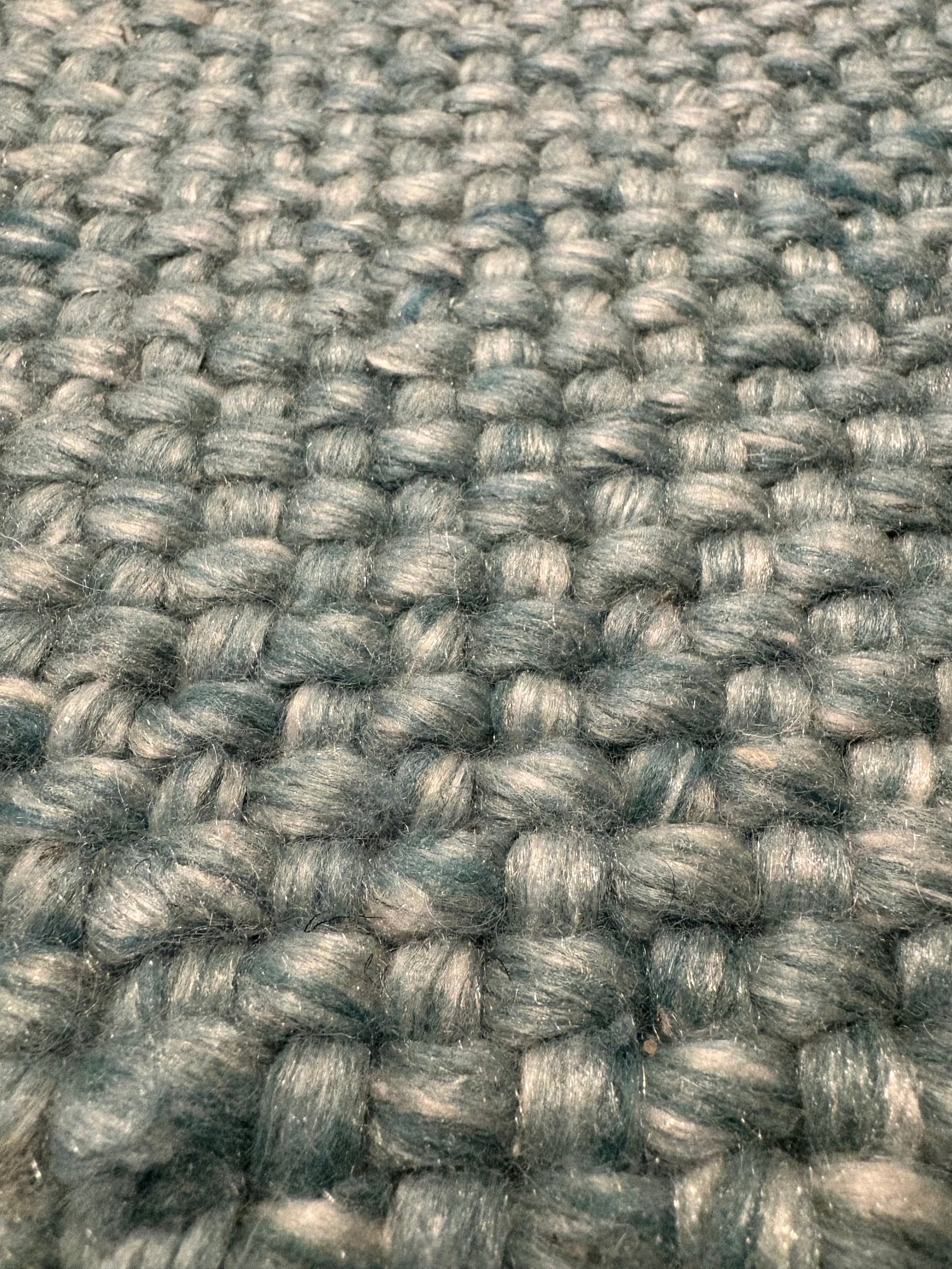 Pacific Green is a handwoven wool and polyester rug with a low-textured cross weave. It boasts a soft pile height of 7-9mm. Colour Aqua Green. Sizes 160 X 230, 200 X 290, 240 X 340 and 300 X 400. Super Close.